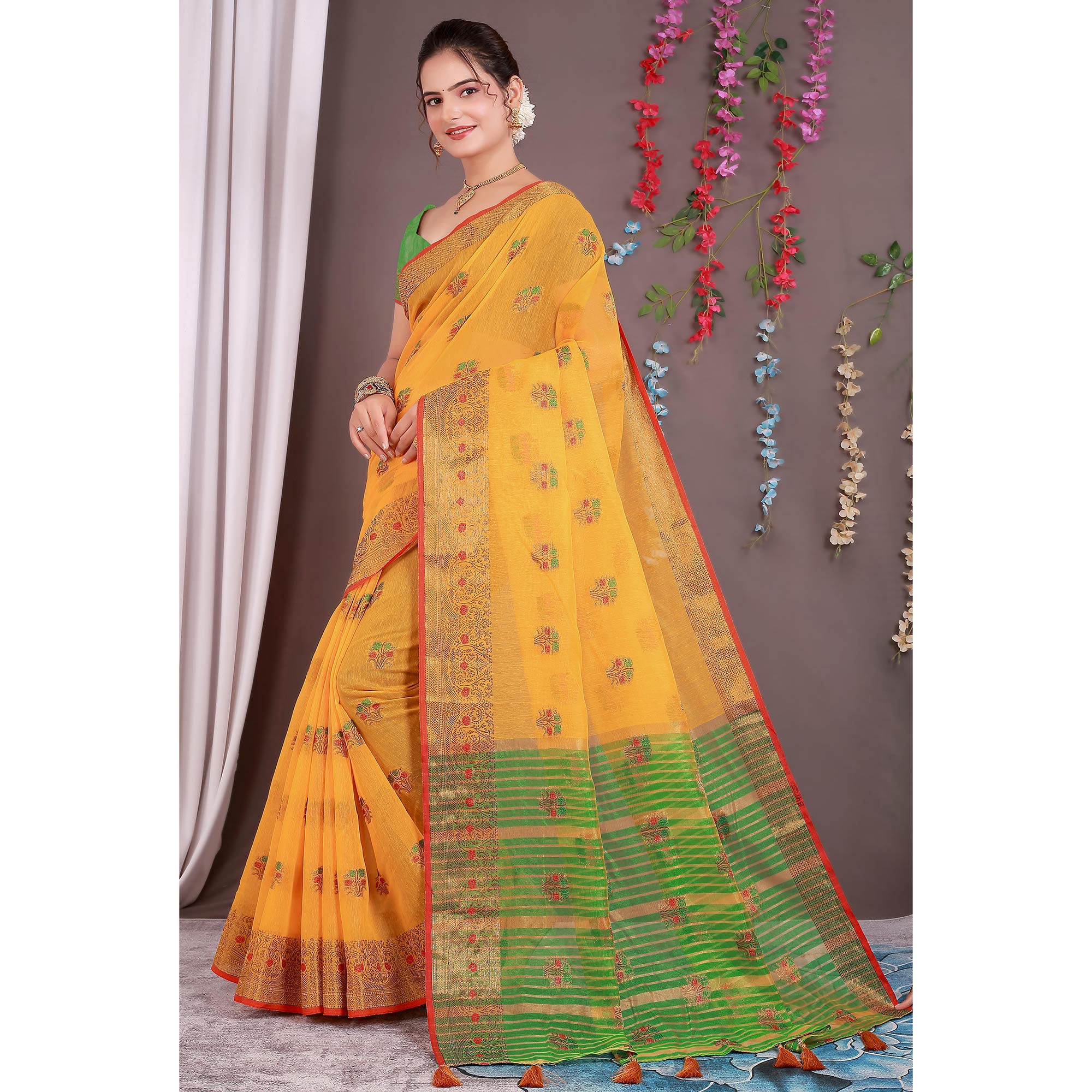 Yellow Floral Woven Cotton Silk Saree With Tassels