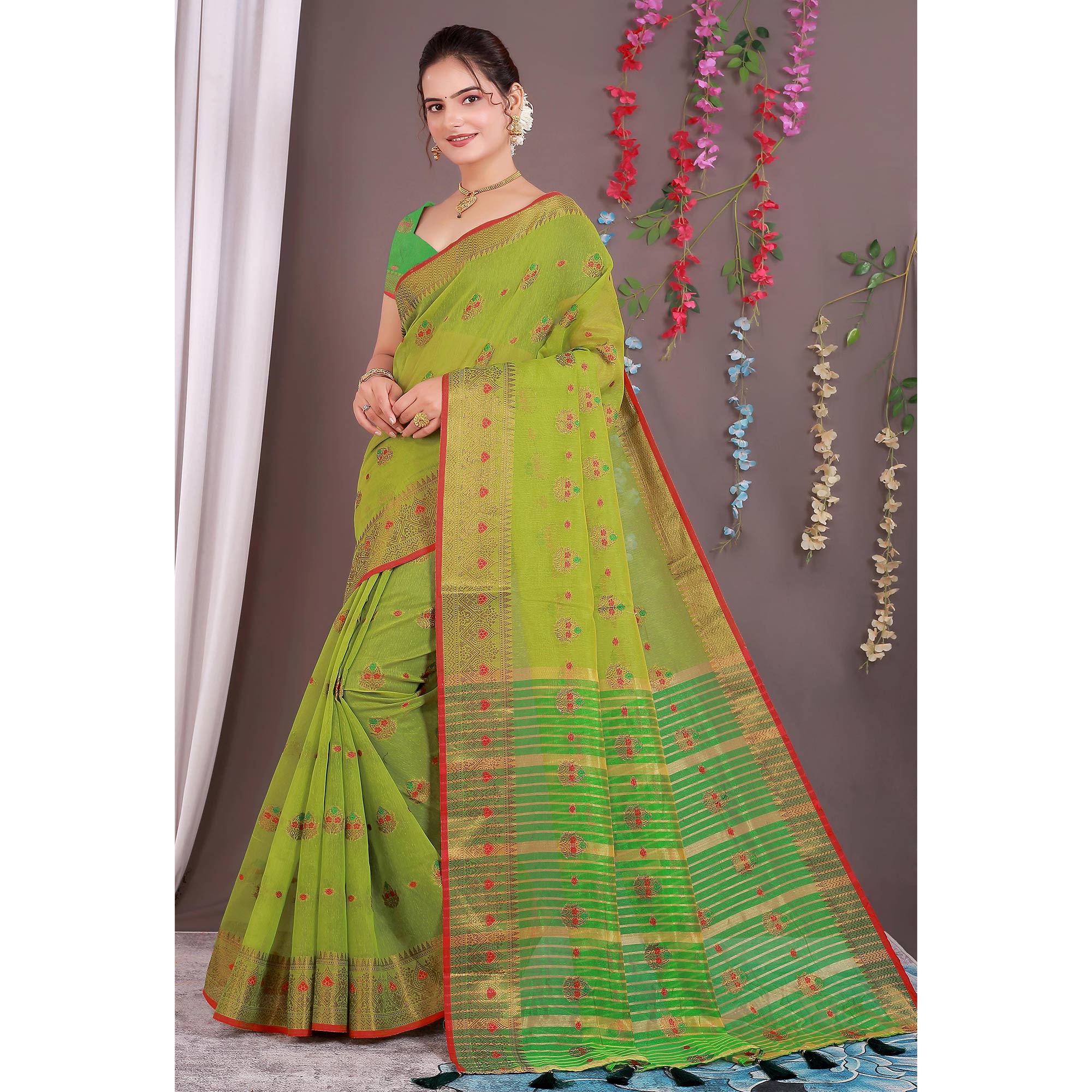 Green Floral Woven Cotton Silk Saree With Tassels