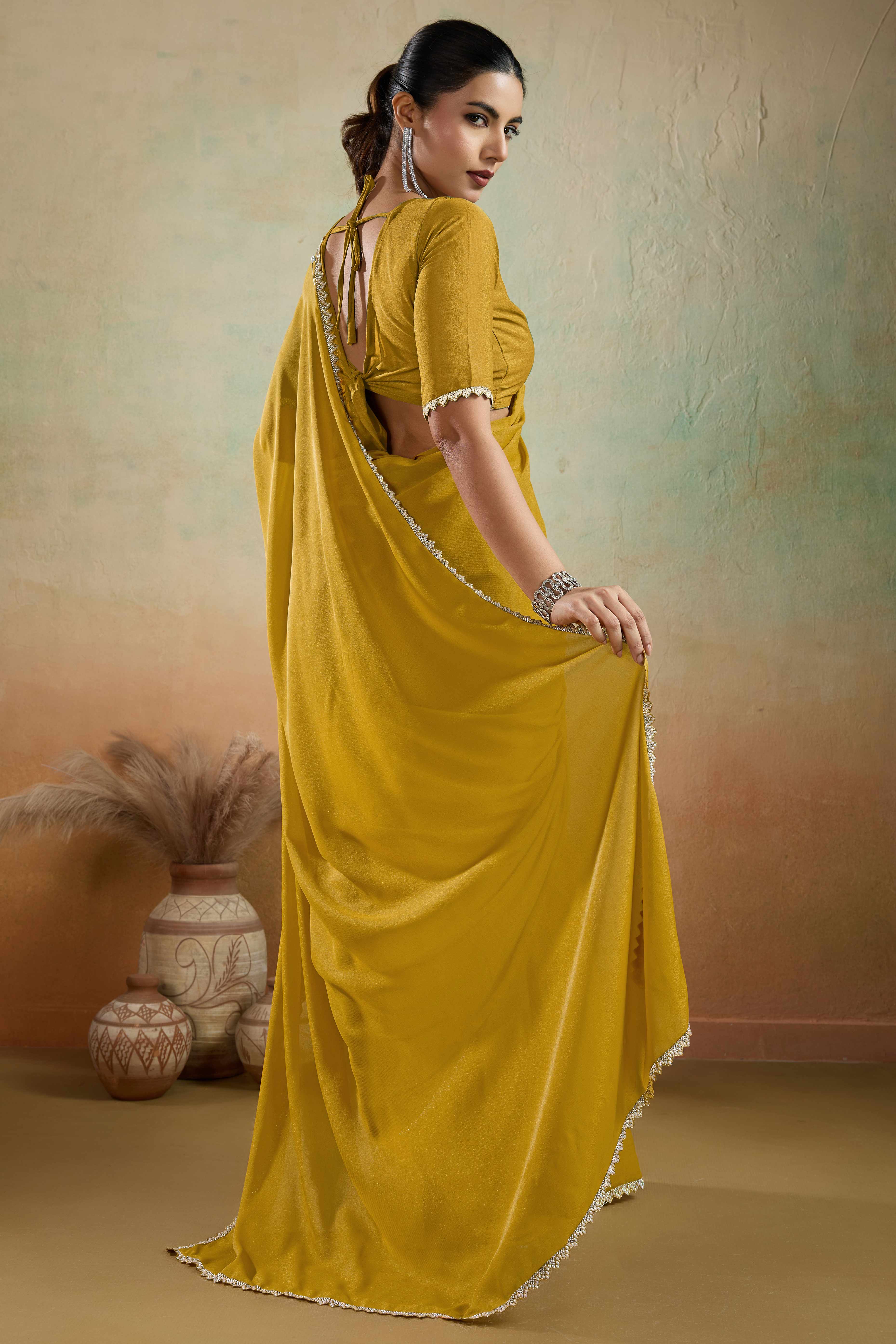 Mustard Solid Matt Georgette Saree With Ceramic Embellished Lace Border