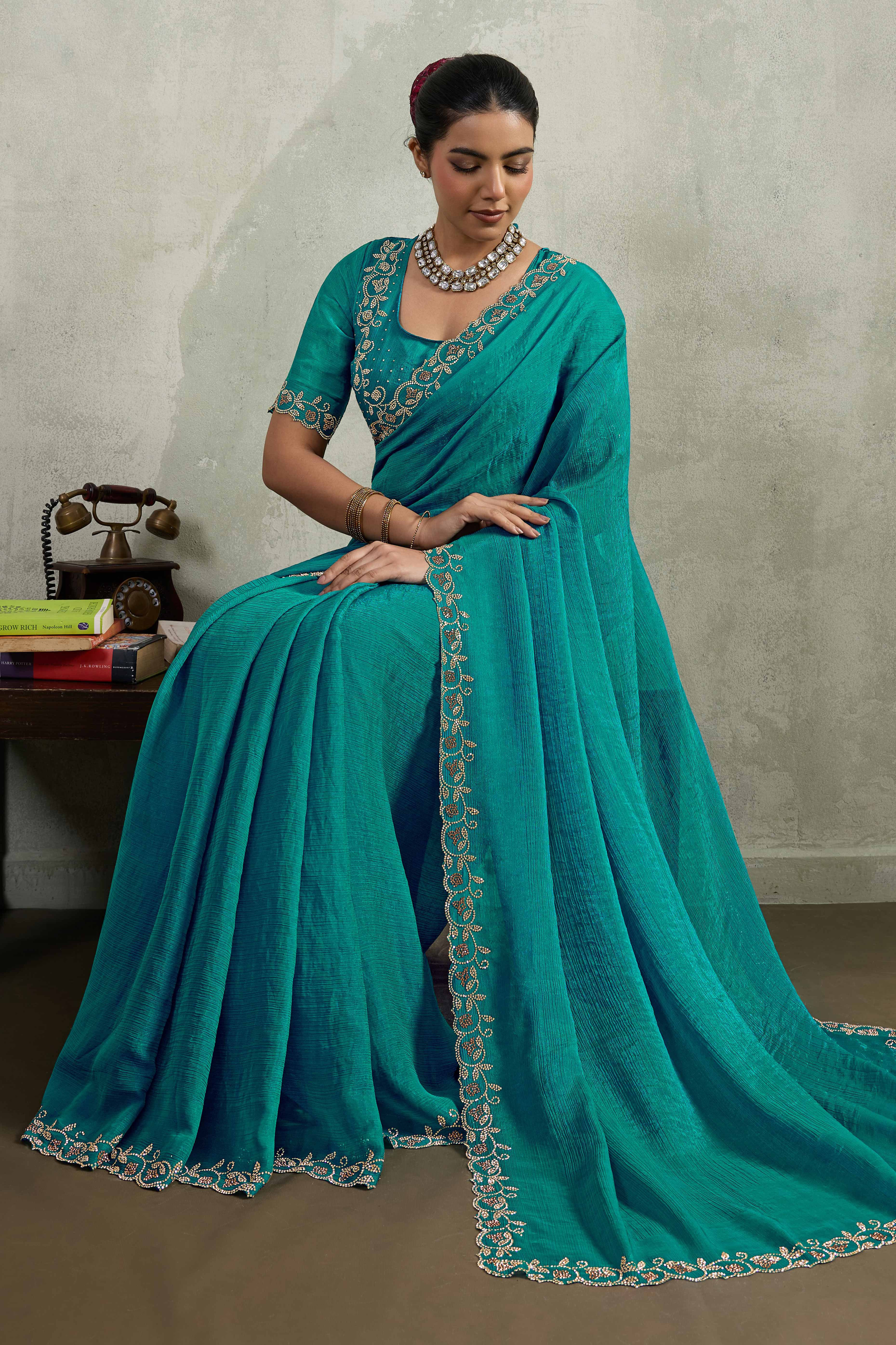 Teal Velvet Chiffon Saree Accented with Sparkling Zarkan Detailing