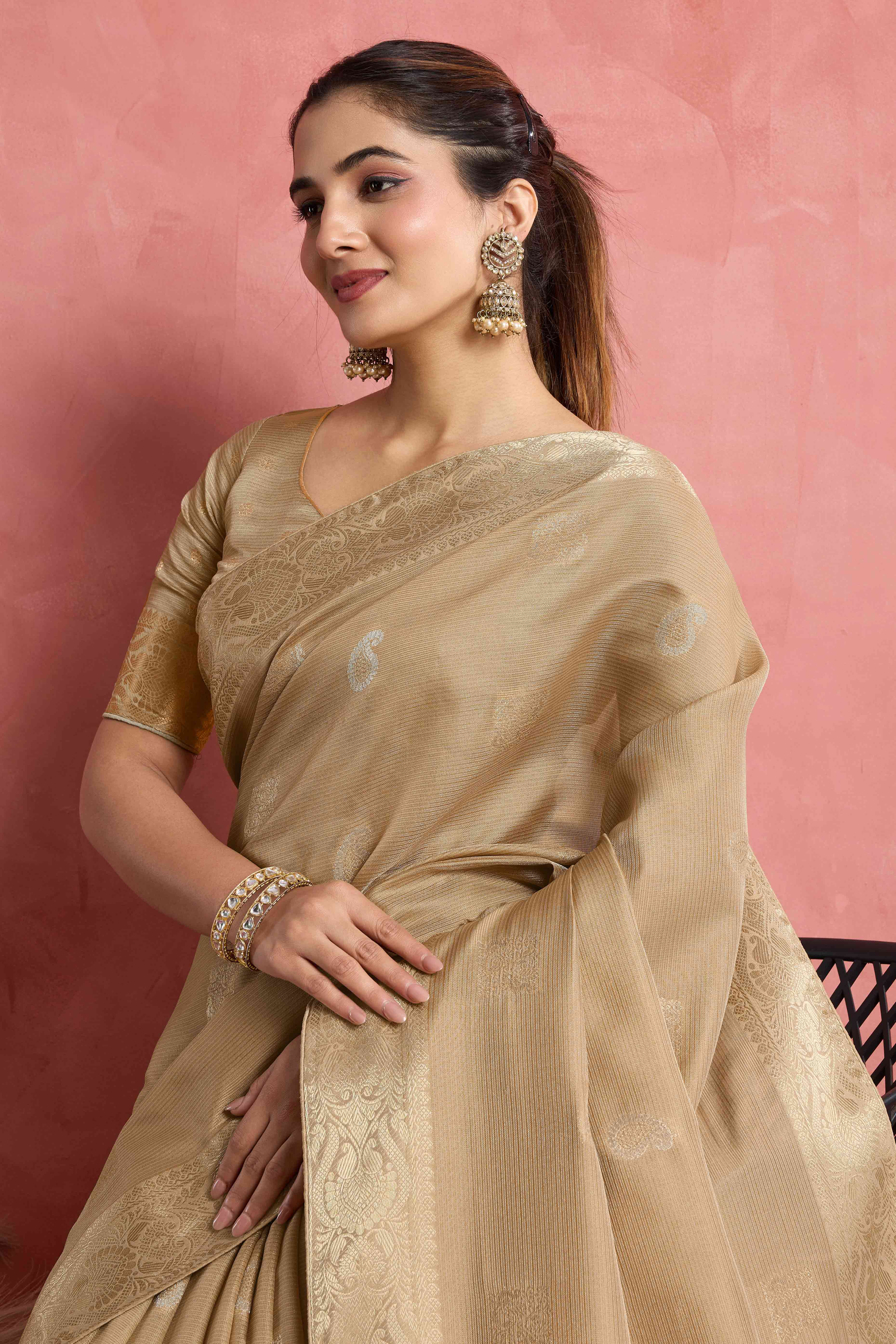 Contemporary Beige Silk Blend Saree Flaunting Alternate Butta With Piping & Tassel Accents