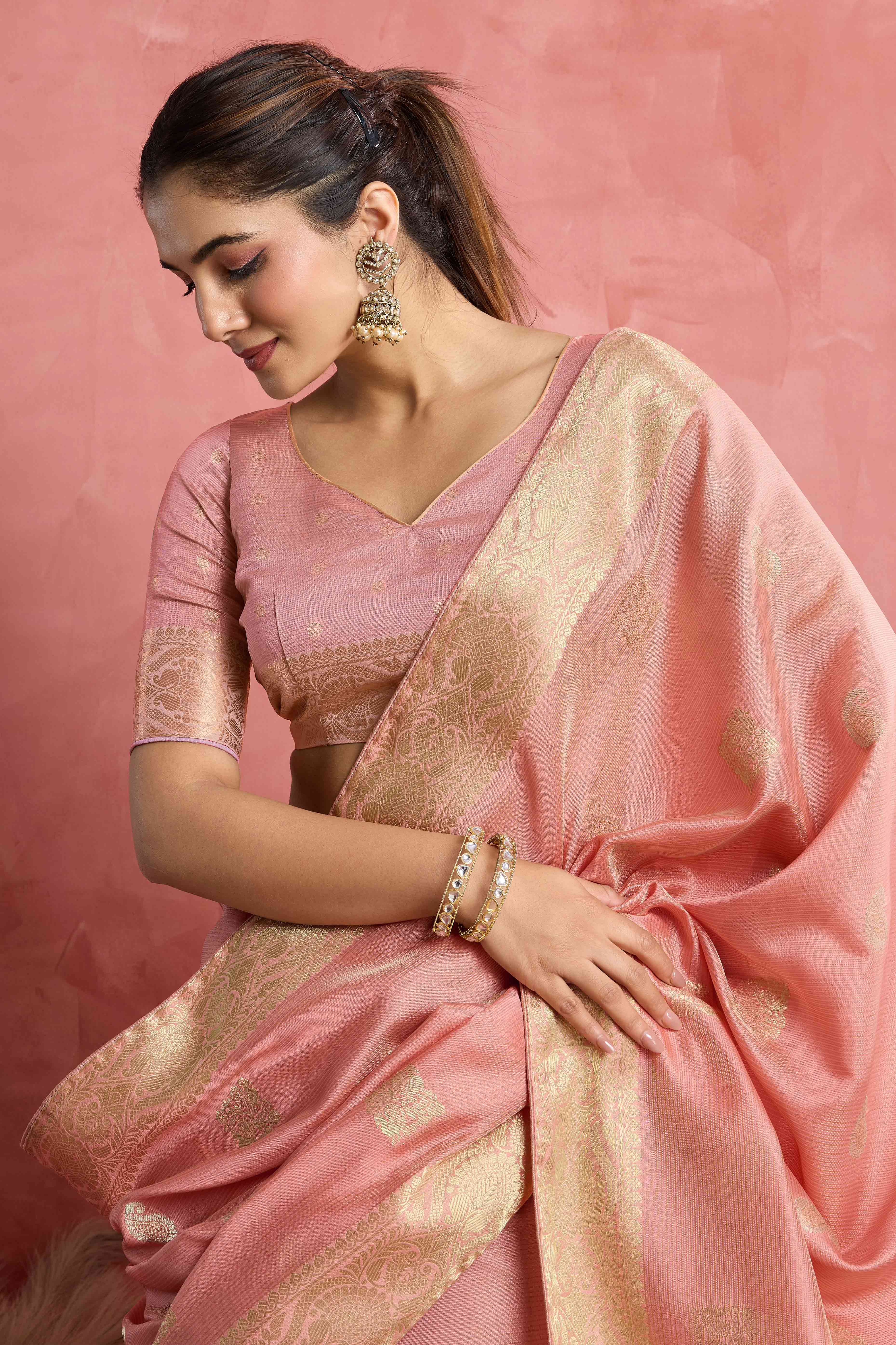Contemporary Gajari Pink Silk Blend Saree Flaunting Alternate Buttas With Piping & Tassel Accents