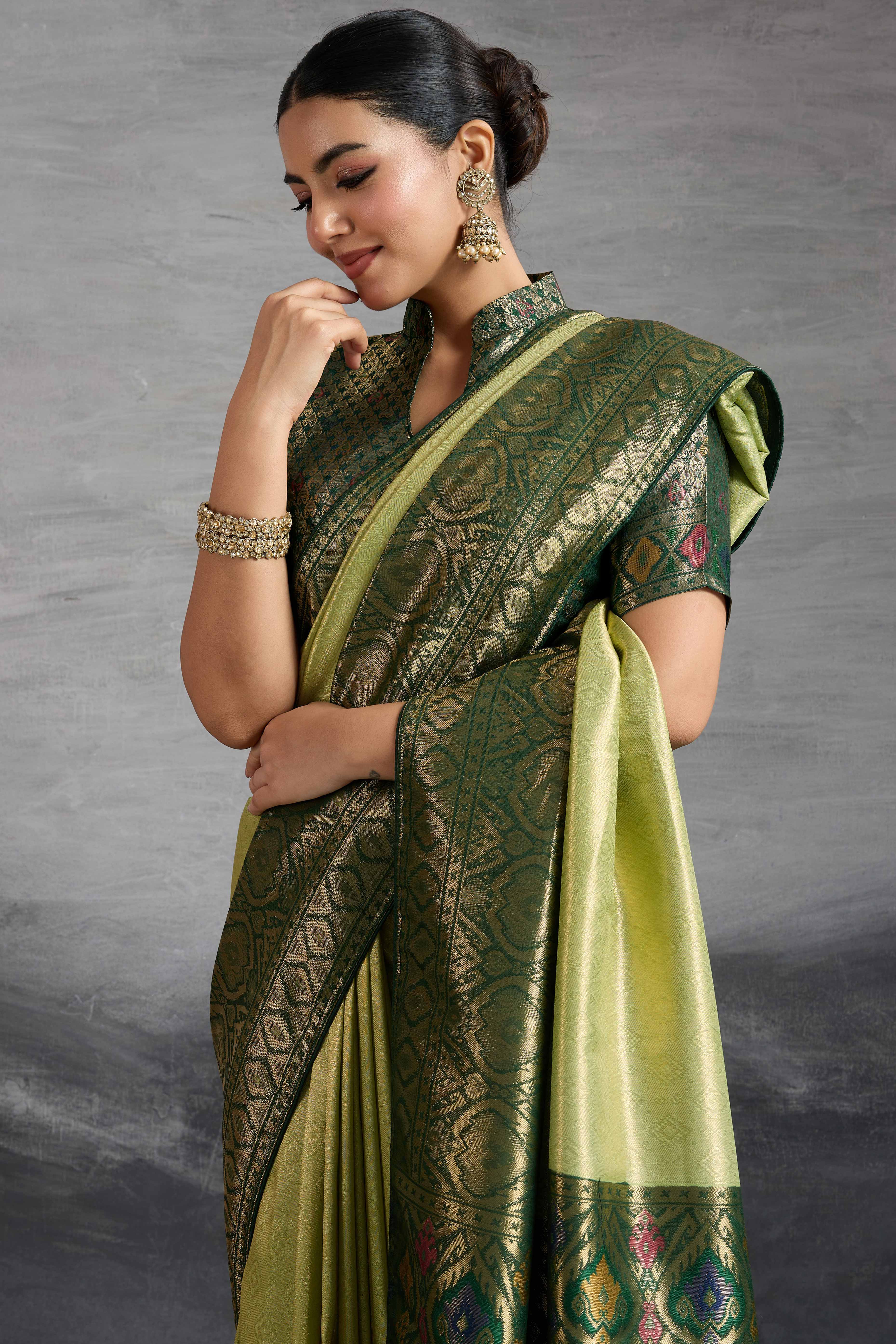 Olive Green Kanjivaram Silk Saree With Traditional Kadiyal Style Zari Weaving &  Meenakari Pallu