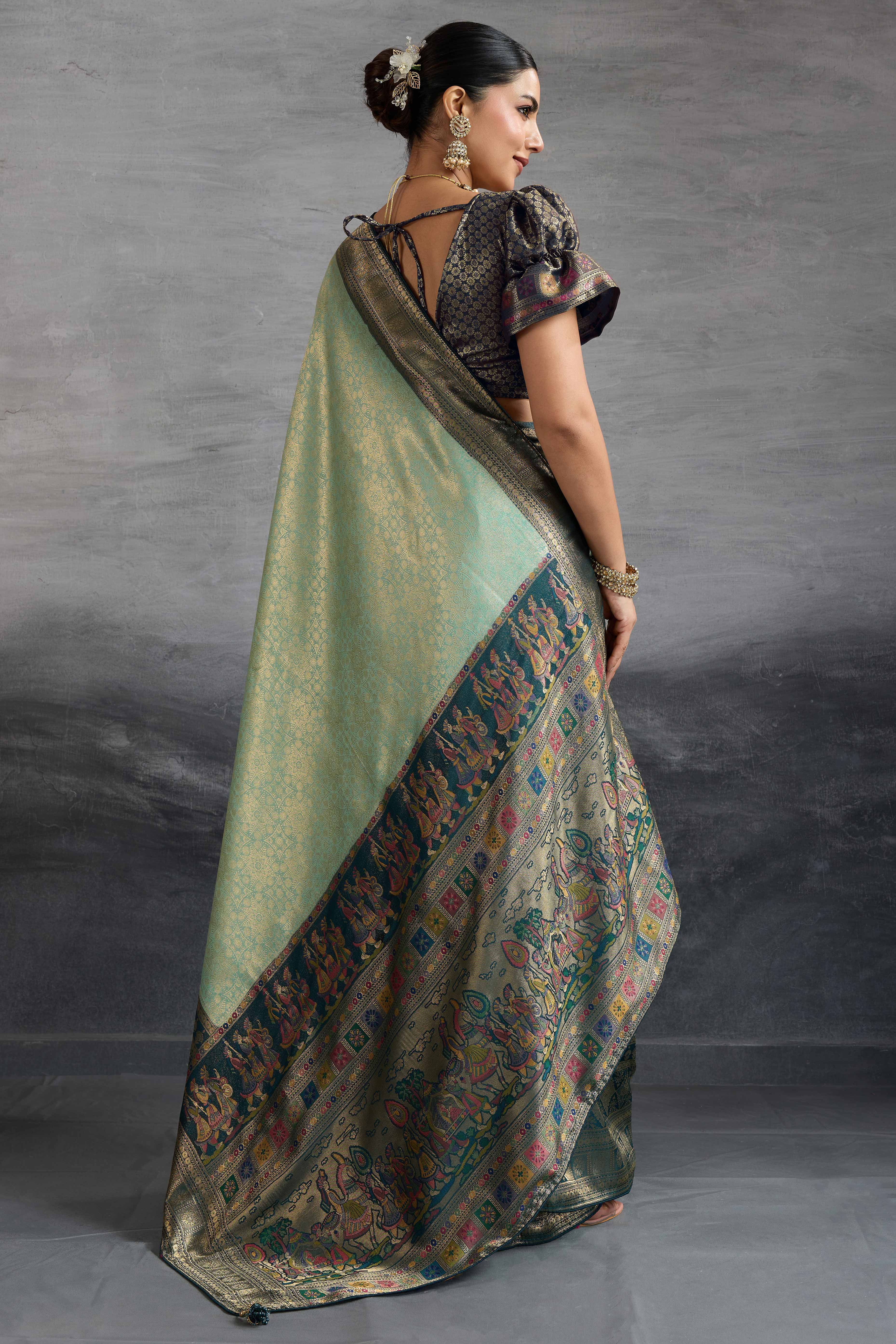 Sea Green Silk Kanjivaram Silk Saree Enhanced With Meenakari Weaving Borders