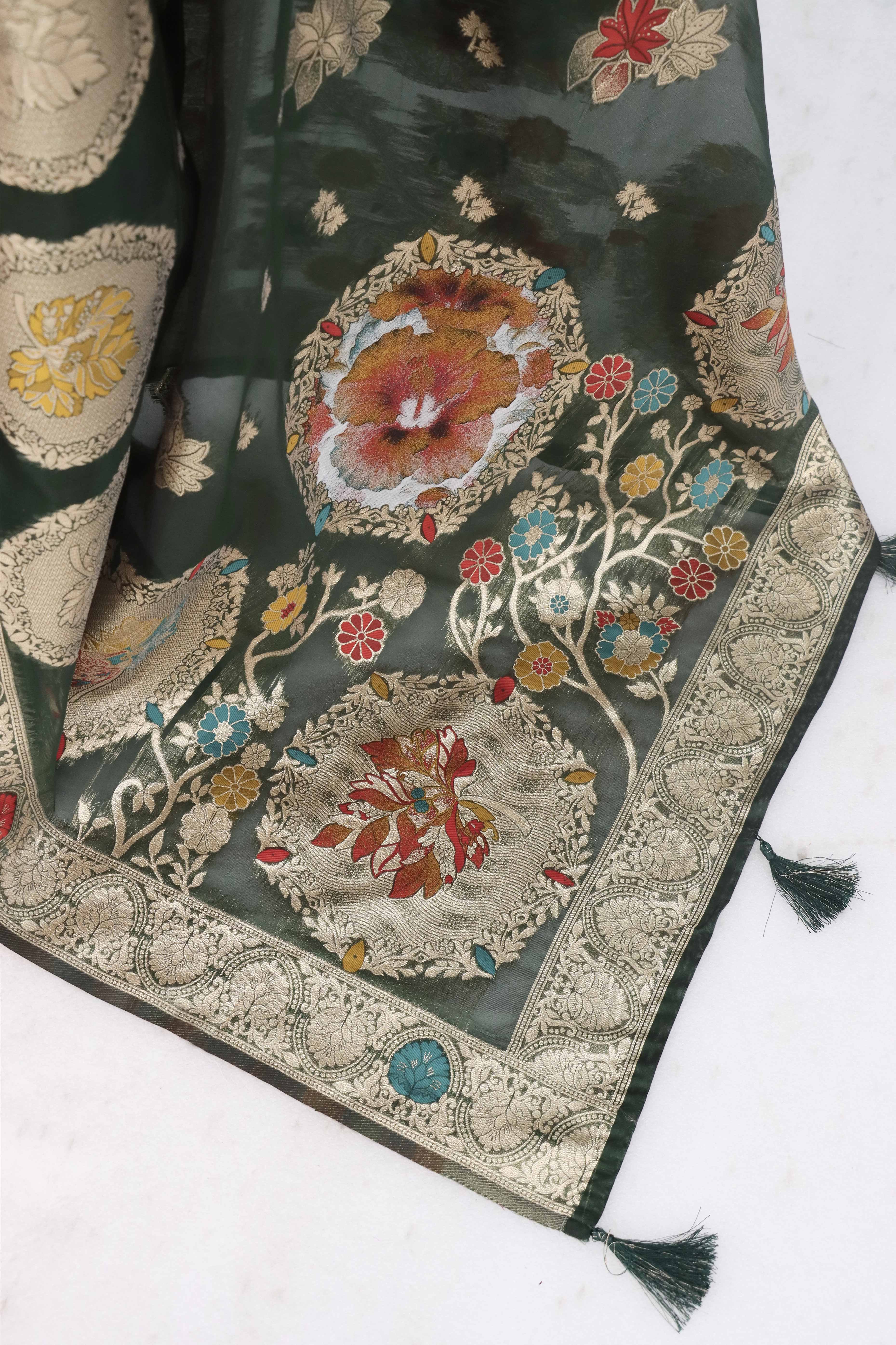 Charming Dark Green Zari Woven Floral Organza Saree Accented With Digital Printed Pallu & Latkan