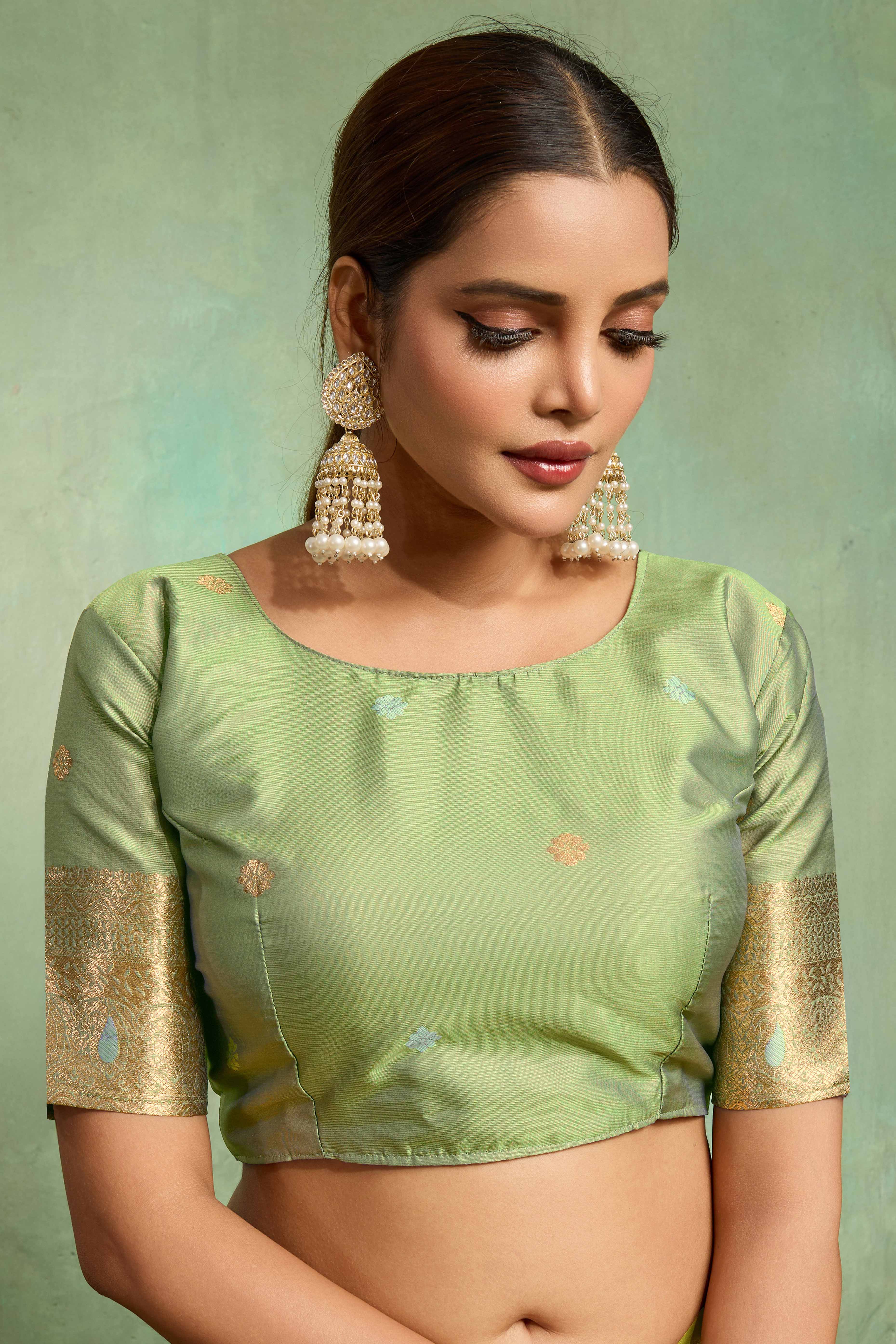 Pista Green Dual Tone Banarasi Silk Saree Accented with Meenakari Weaves