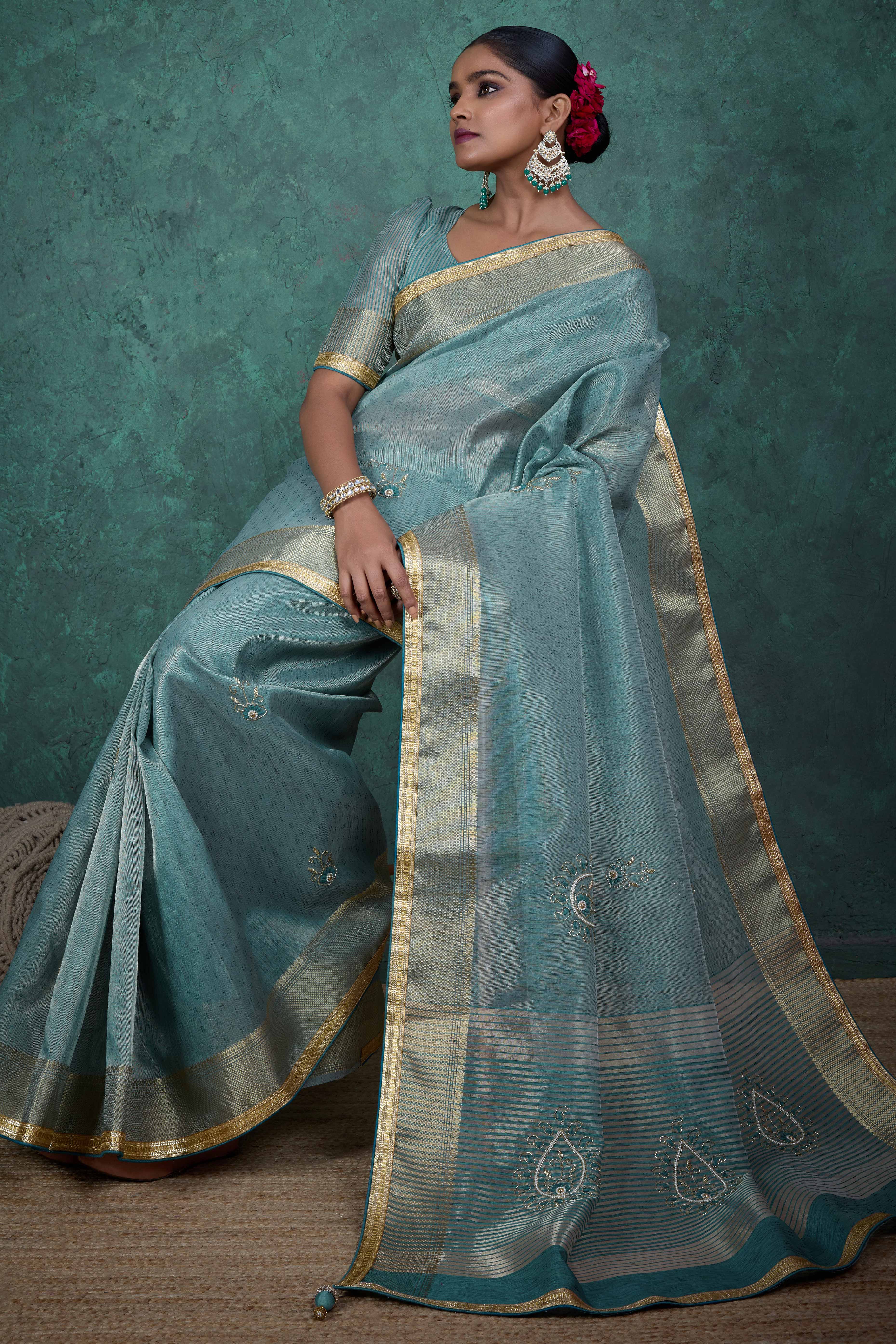 Teal Woven Linen Tissue Saree Featuring Beads Embellishment