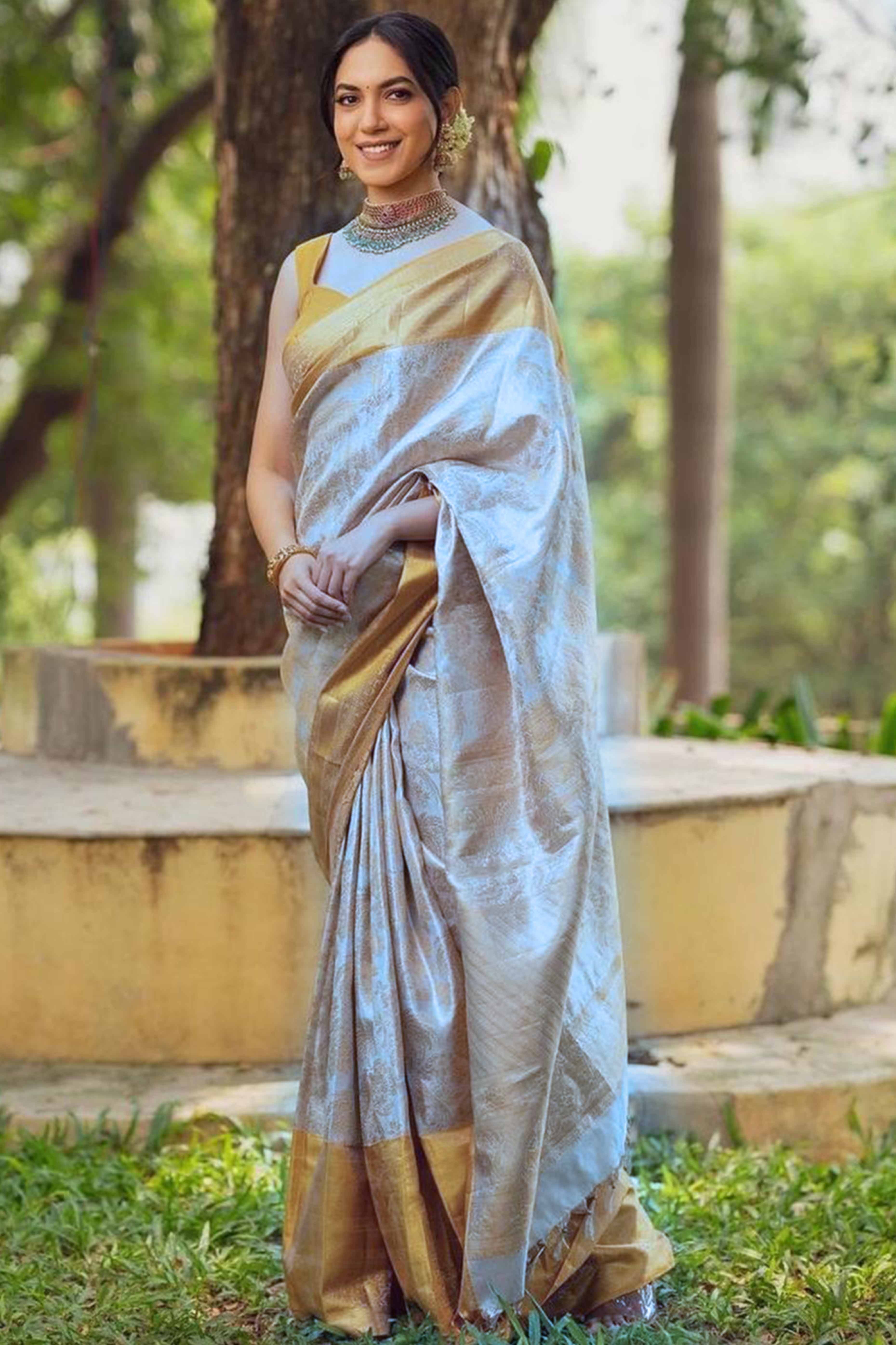 Charming White & Yellow Floral Zari Woven Lichi Banarasi Silk Saree