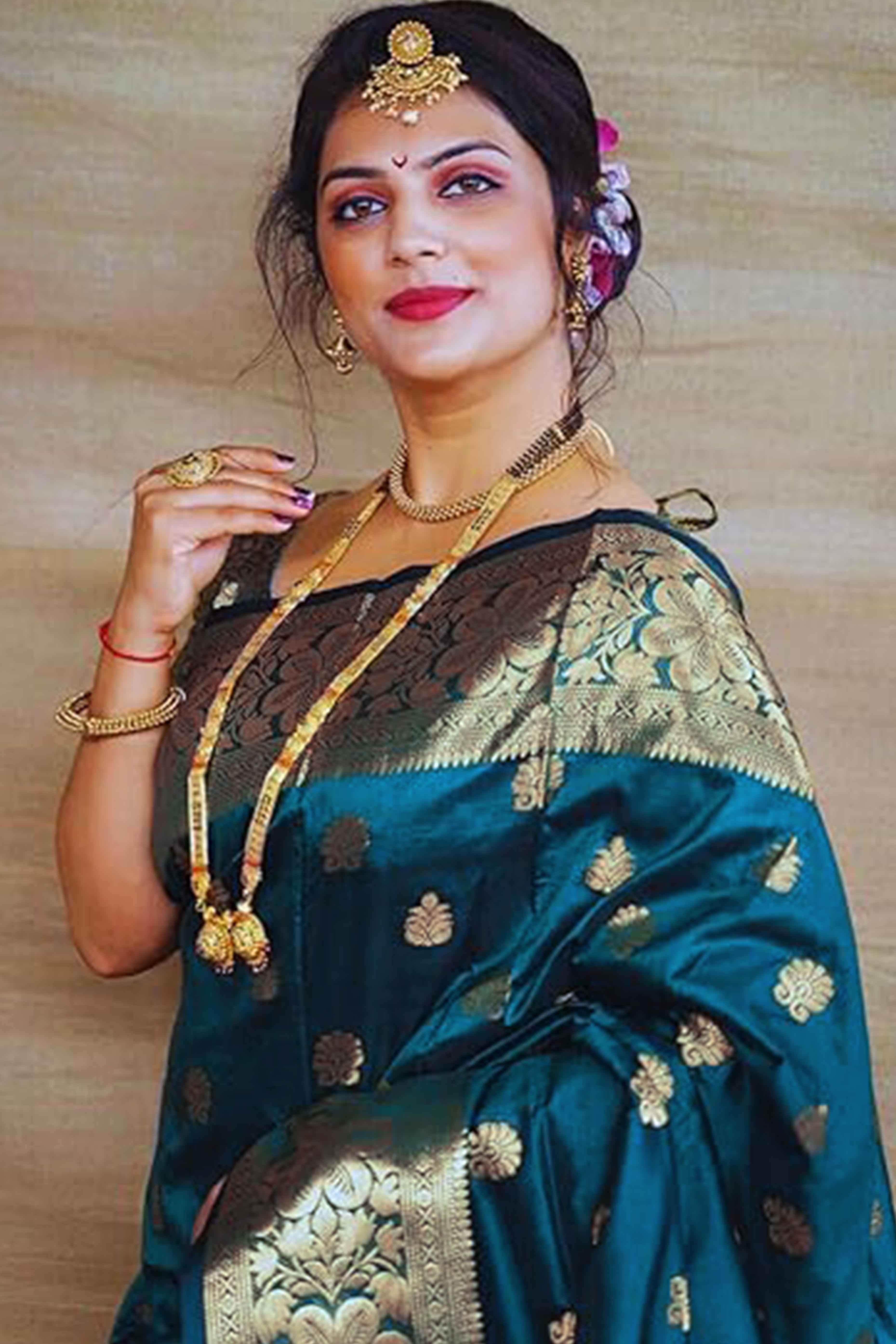 Teal Banarasi Silk Saree With Intricate Zari Butti Weaving