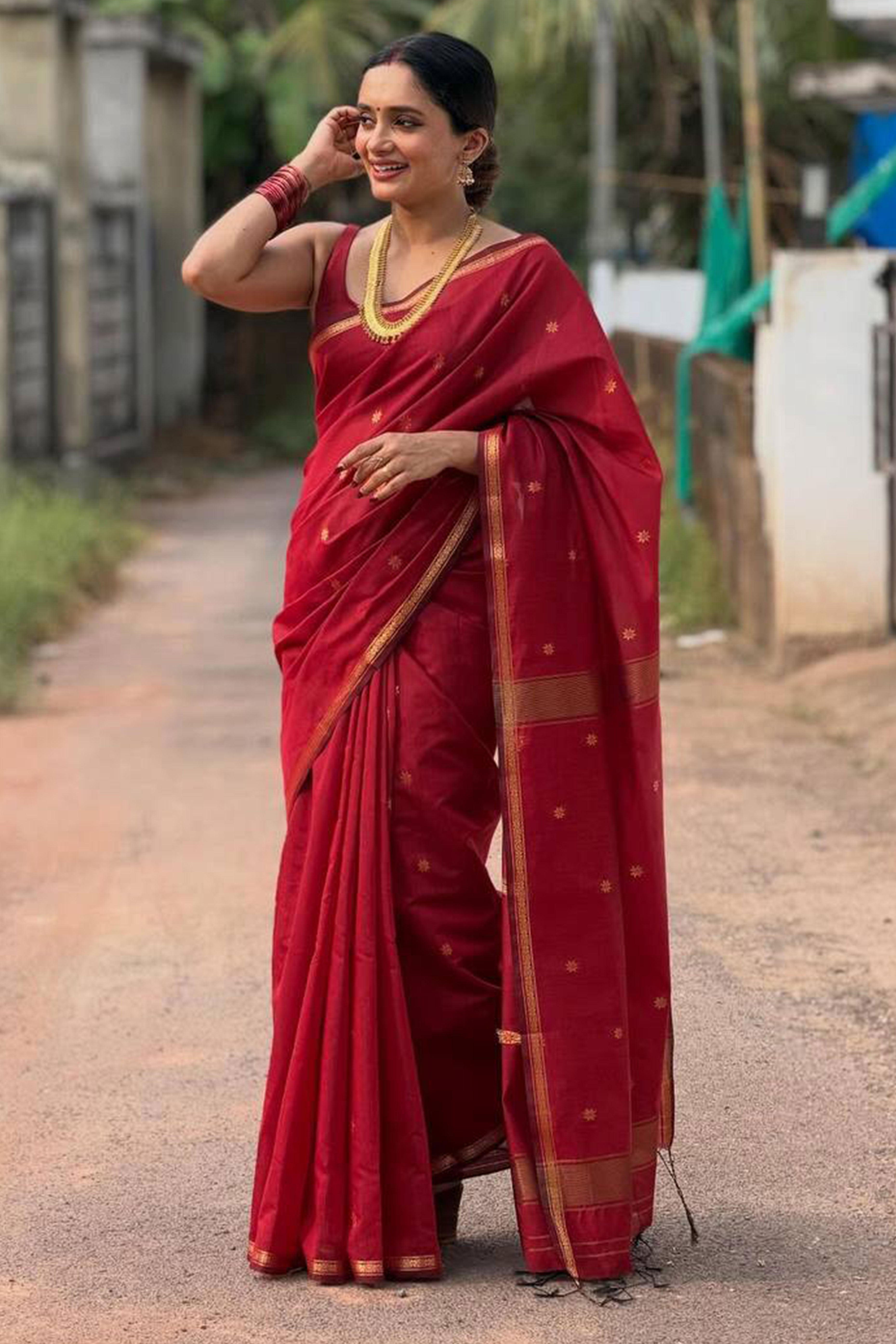 Maroon Classic Linen Cotton Saree Enhanced with Fine Zari Butti Weaving Detailing