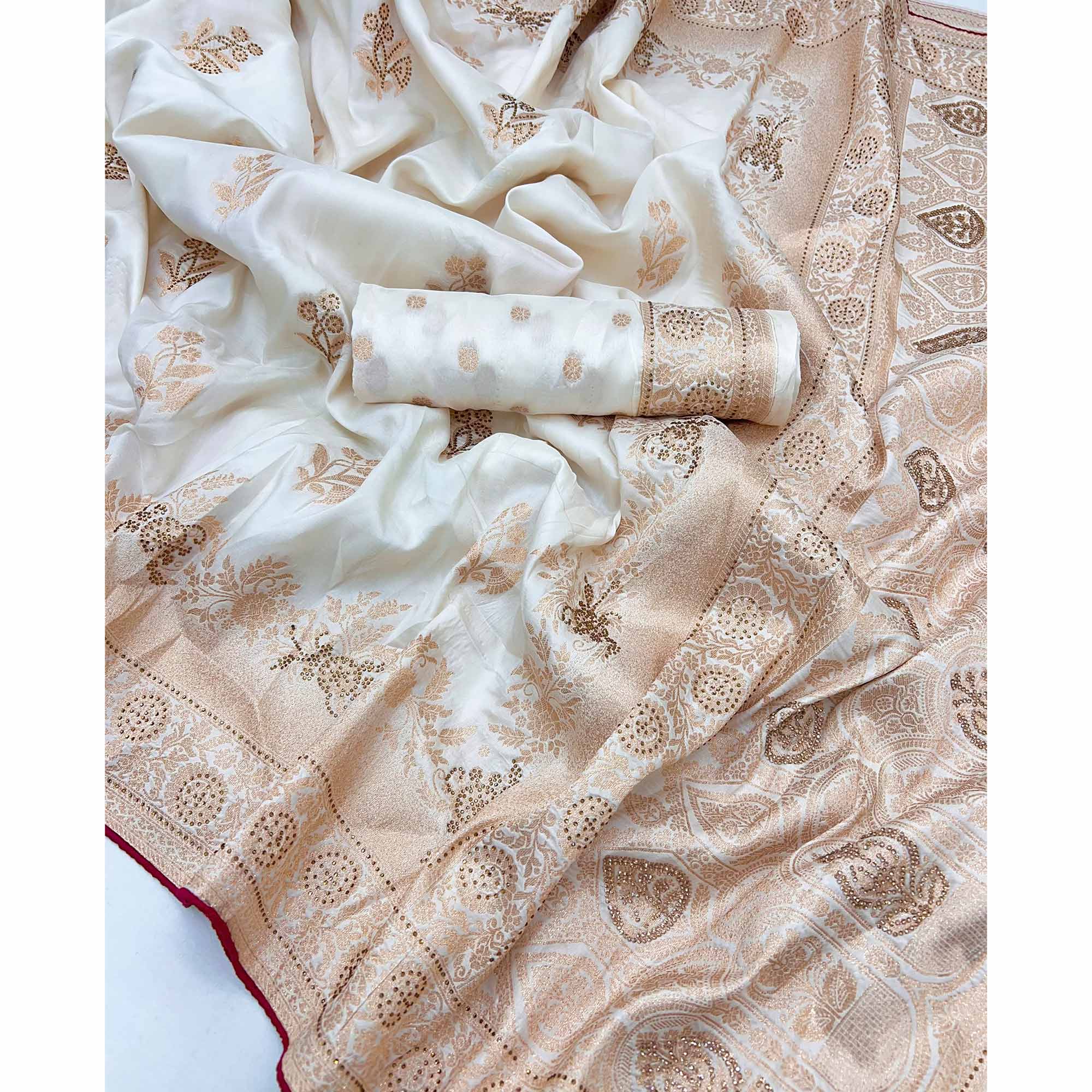 Offwhite Elegant White Dola Silk Saree with Intricate Weaving and Sparkling Stonework
