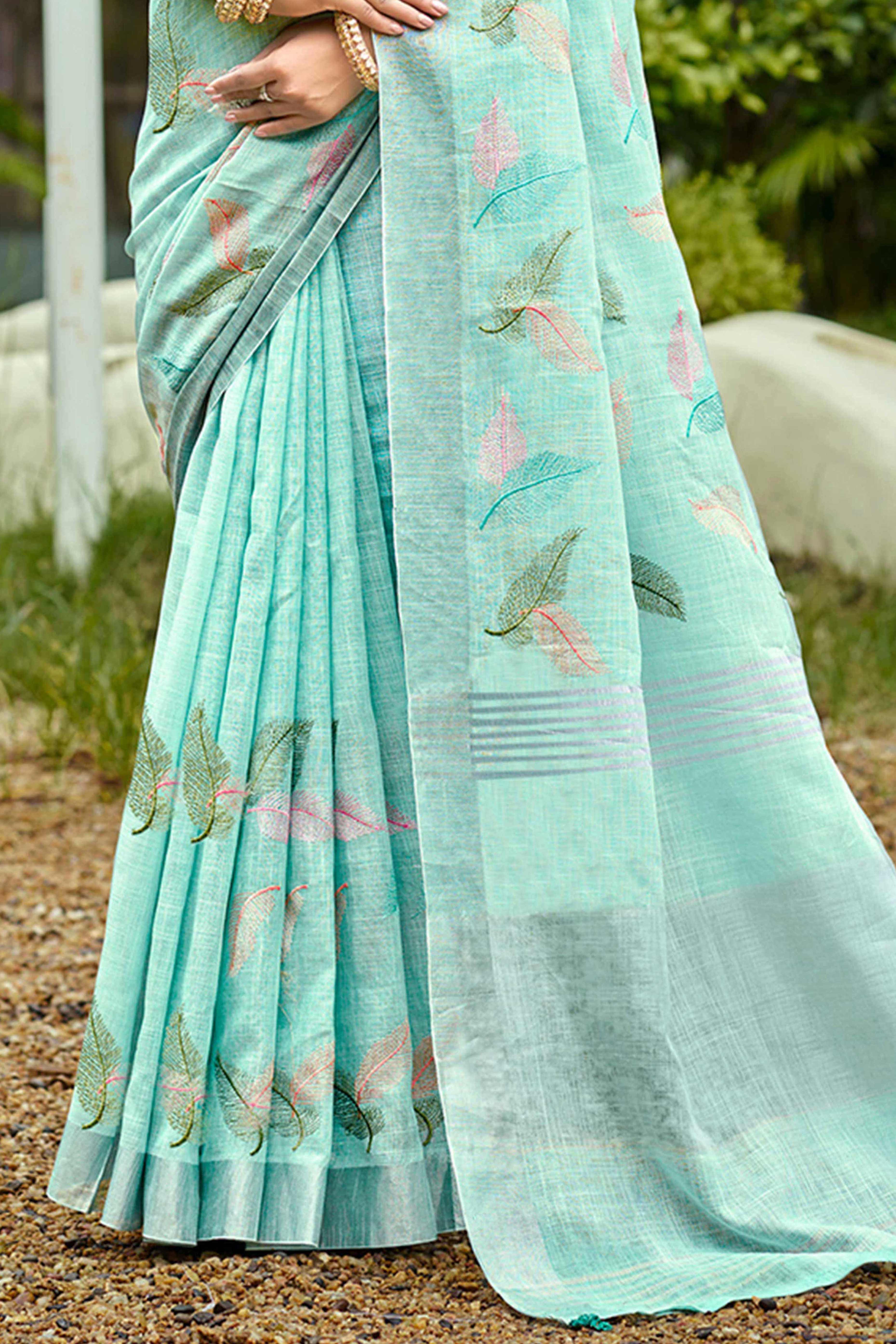 Exquisite Turquoise Leaf Motif Thread Embroidered Linen Saree With Elegant Weaving Border