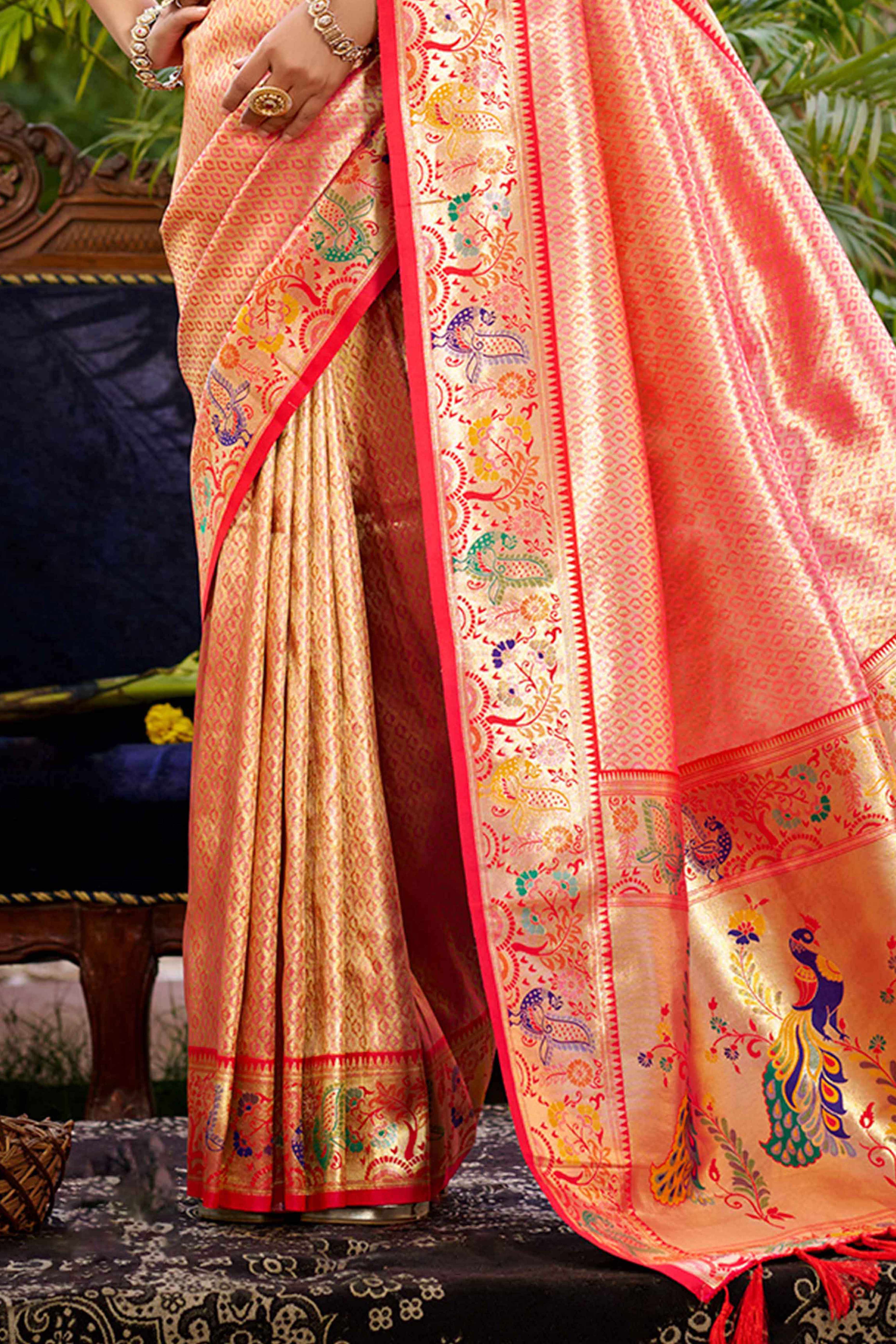 Graceful Pink Silk Blend Saree Adorned With Intricate Zari Weave & Peacock Motif Pallu