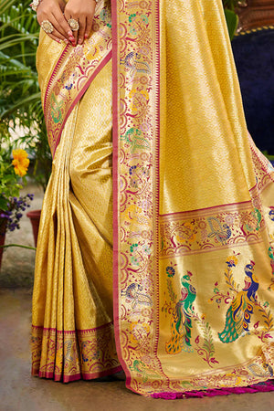 Graceful Yellow Silk Blend Saree Adorned With Intricate Zari Weave & Peacock Motif Pallu