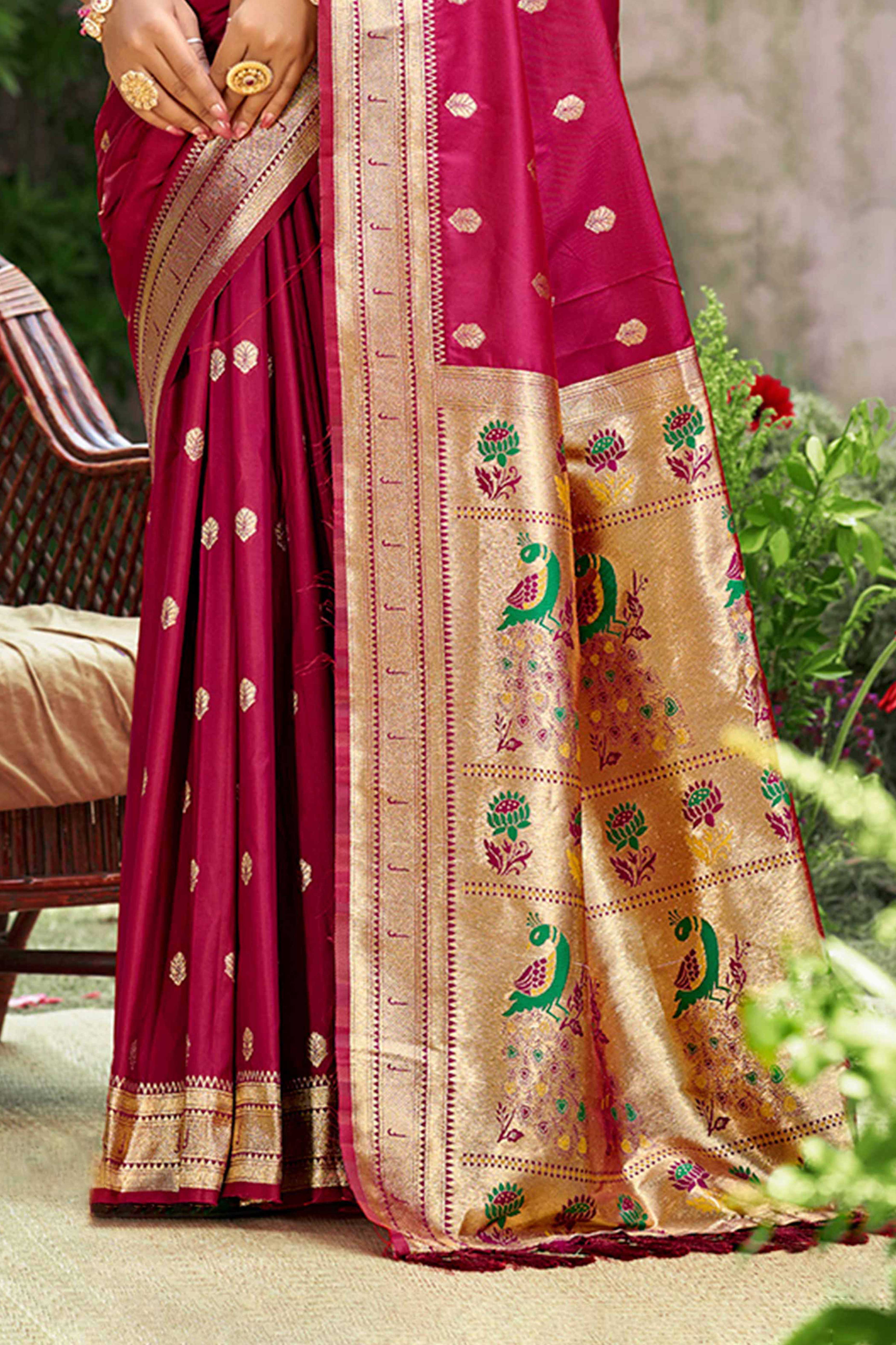 Deep Magenta Zari Weaving Silk Blend Saree Adorned With Peacock Motif Pallu & Graceful Tassel