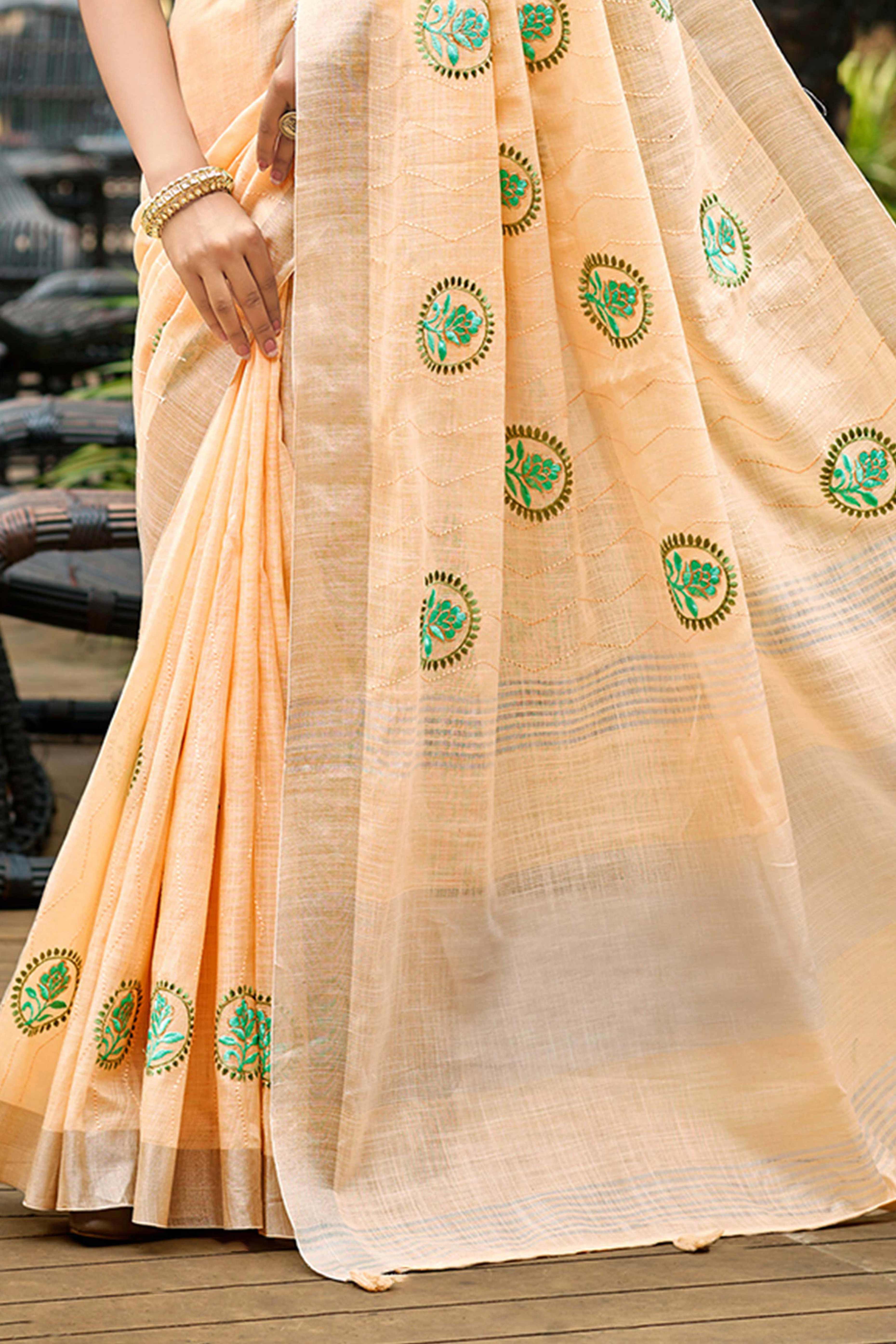 Premium Light Peach Floral Embroidered Linen Saree With Striped Pattern Tassel Pallu