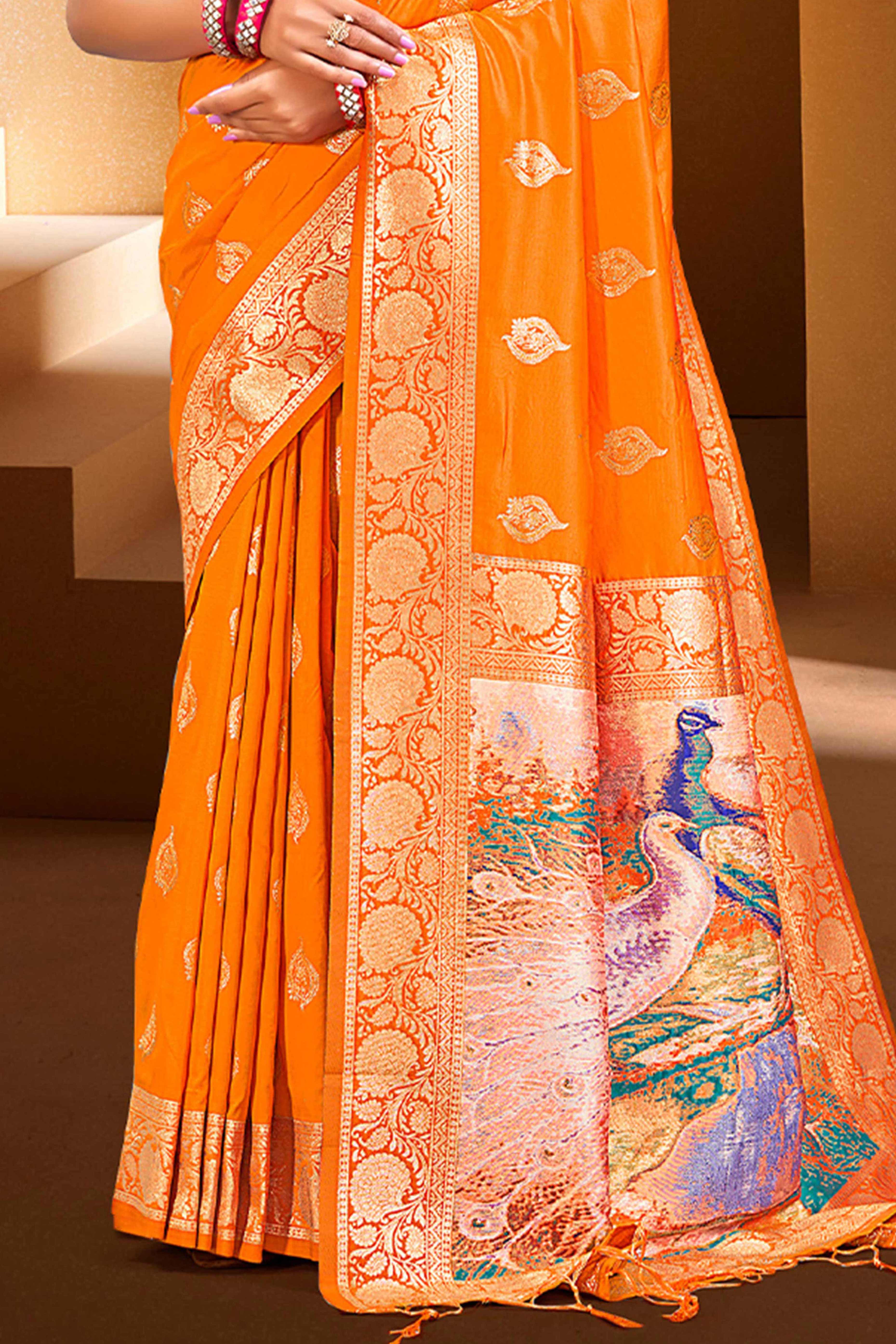 Luxury Orange Floral Weaving Silk Blend Saree Finished With A Digital Peacock Printed Pallu
