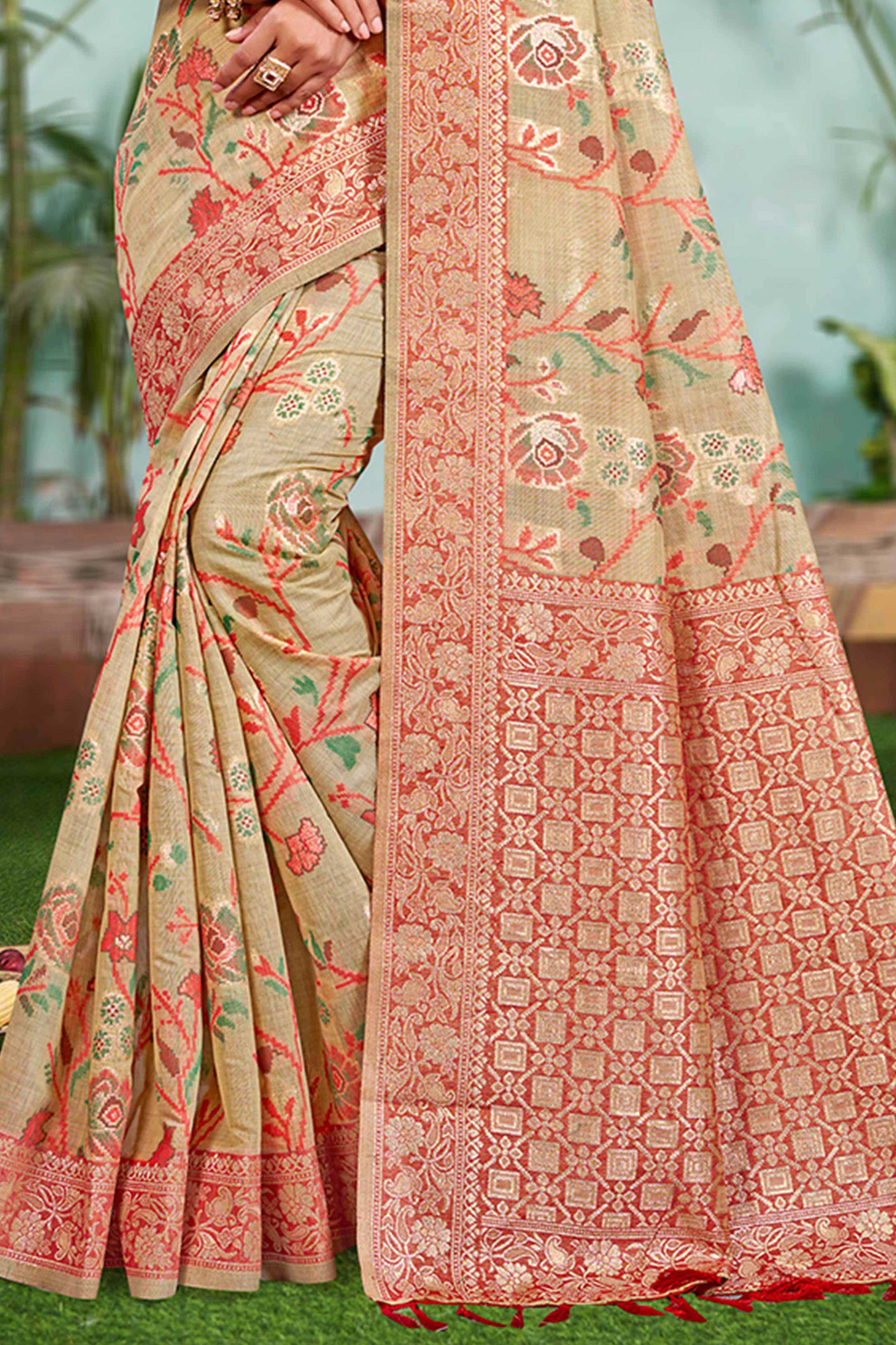 Captivating Beige Floral Zari Weaving Cotton Silk Saree Accented With Tassel Pallu