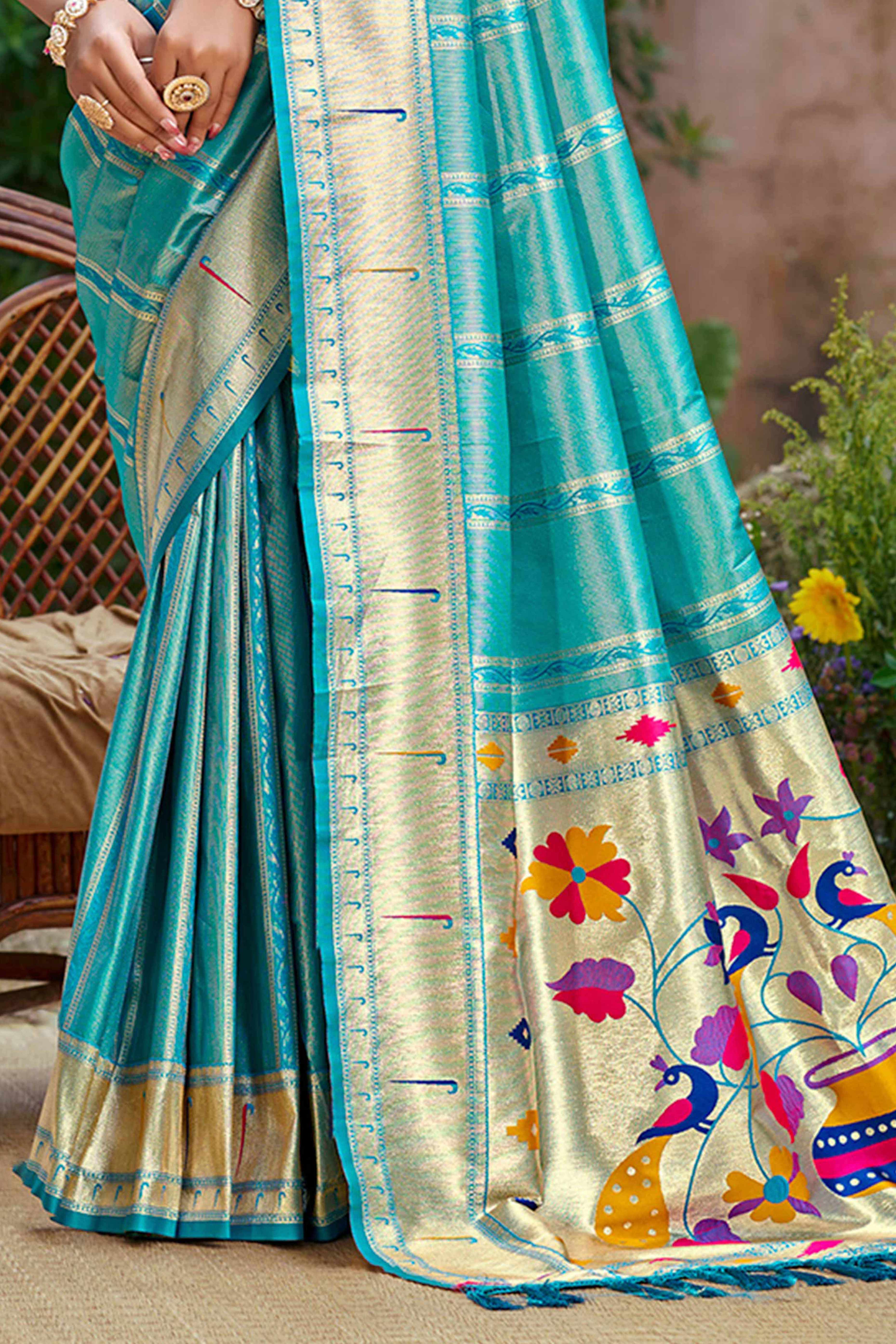 Turquoise Blue Designer Weaving Silk Blend Saree Accented With Graceful Peacock & Floral Motif Pallu