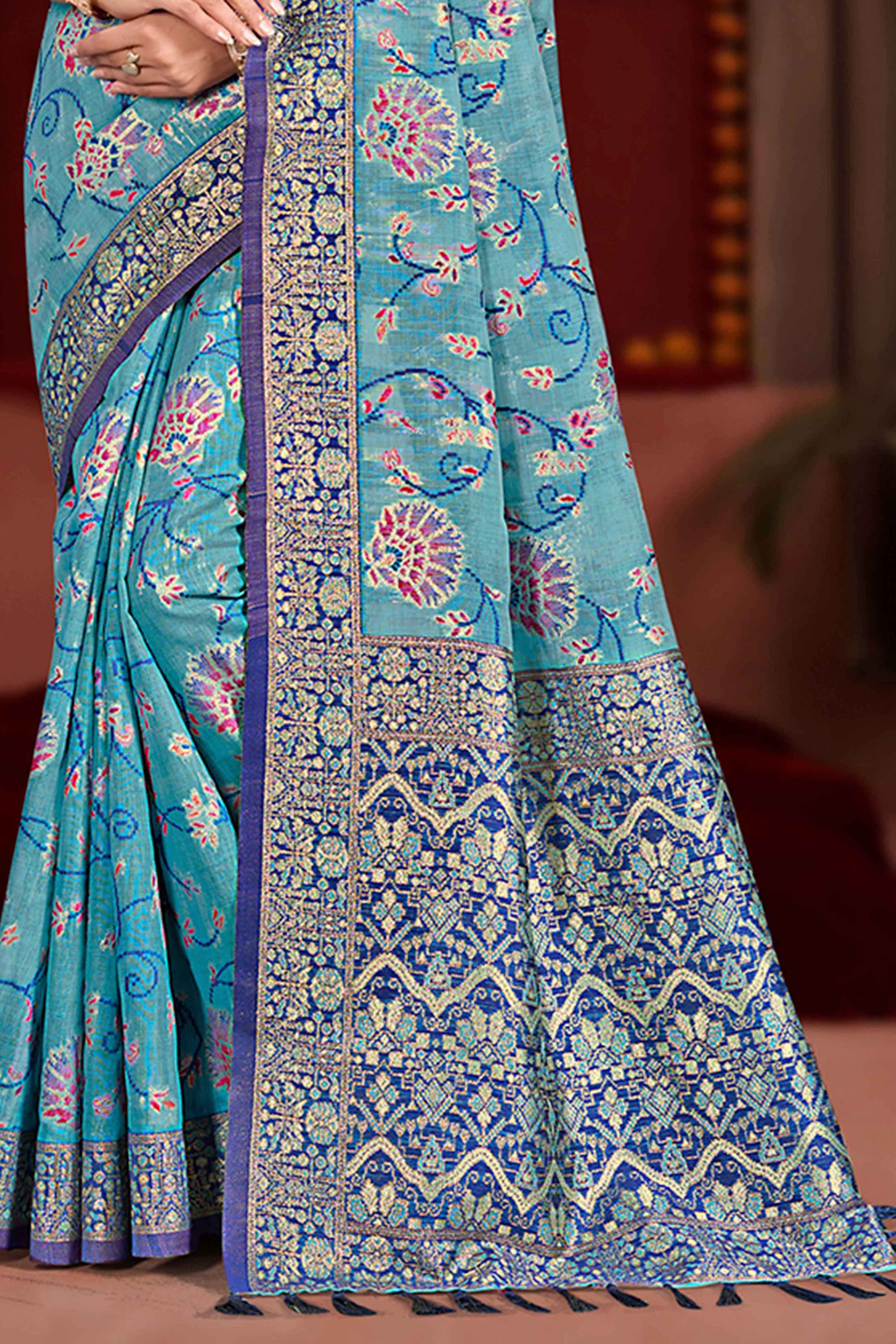 Elegant Blue Cotton Silk Saree Adorned With Floral Weaving & Graceful Tassel Pallu