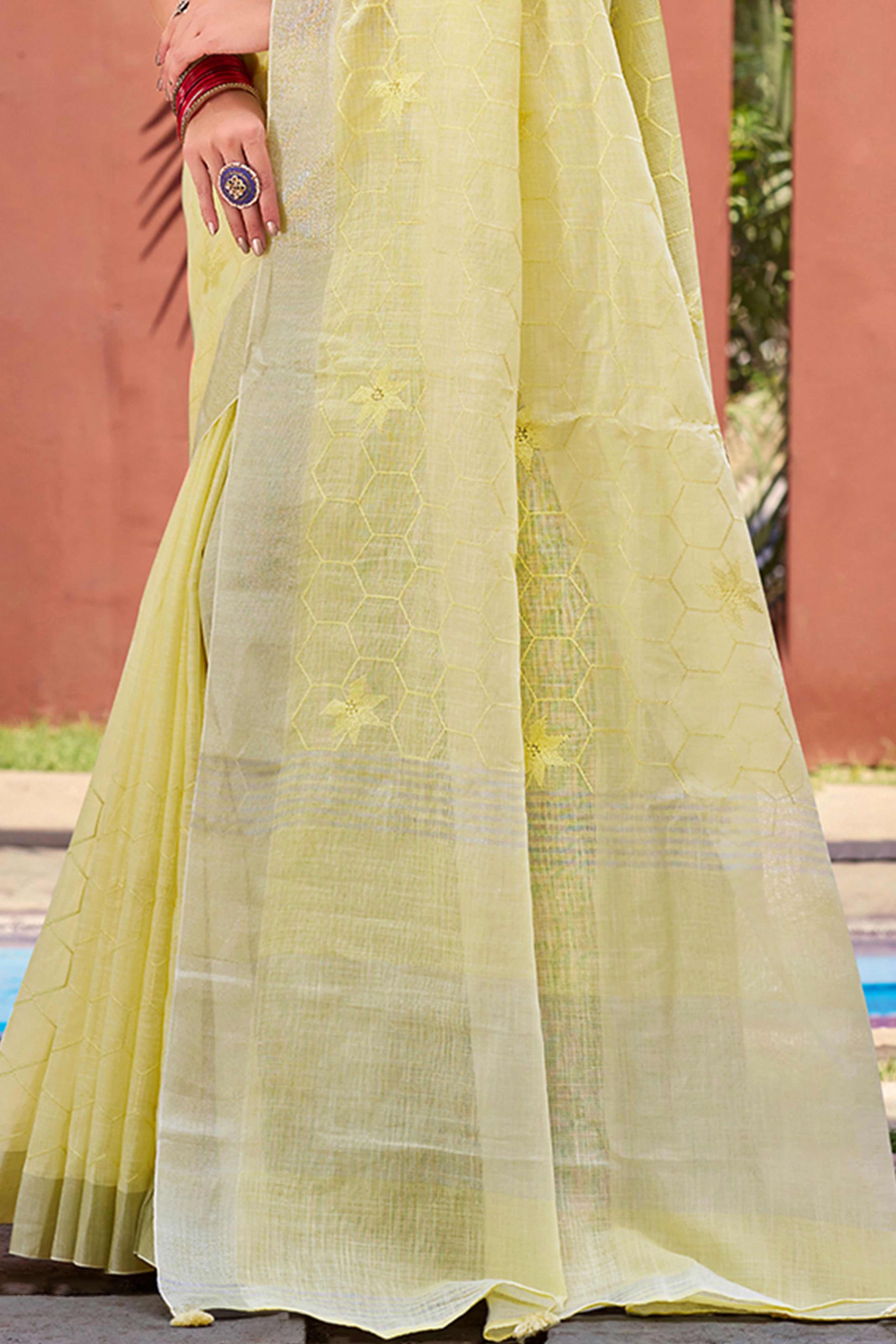 Yellow Classic Linen Saree Enhanced With Fine Geometric Embroidery Work & Tassel Pallu
