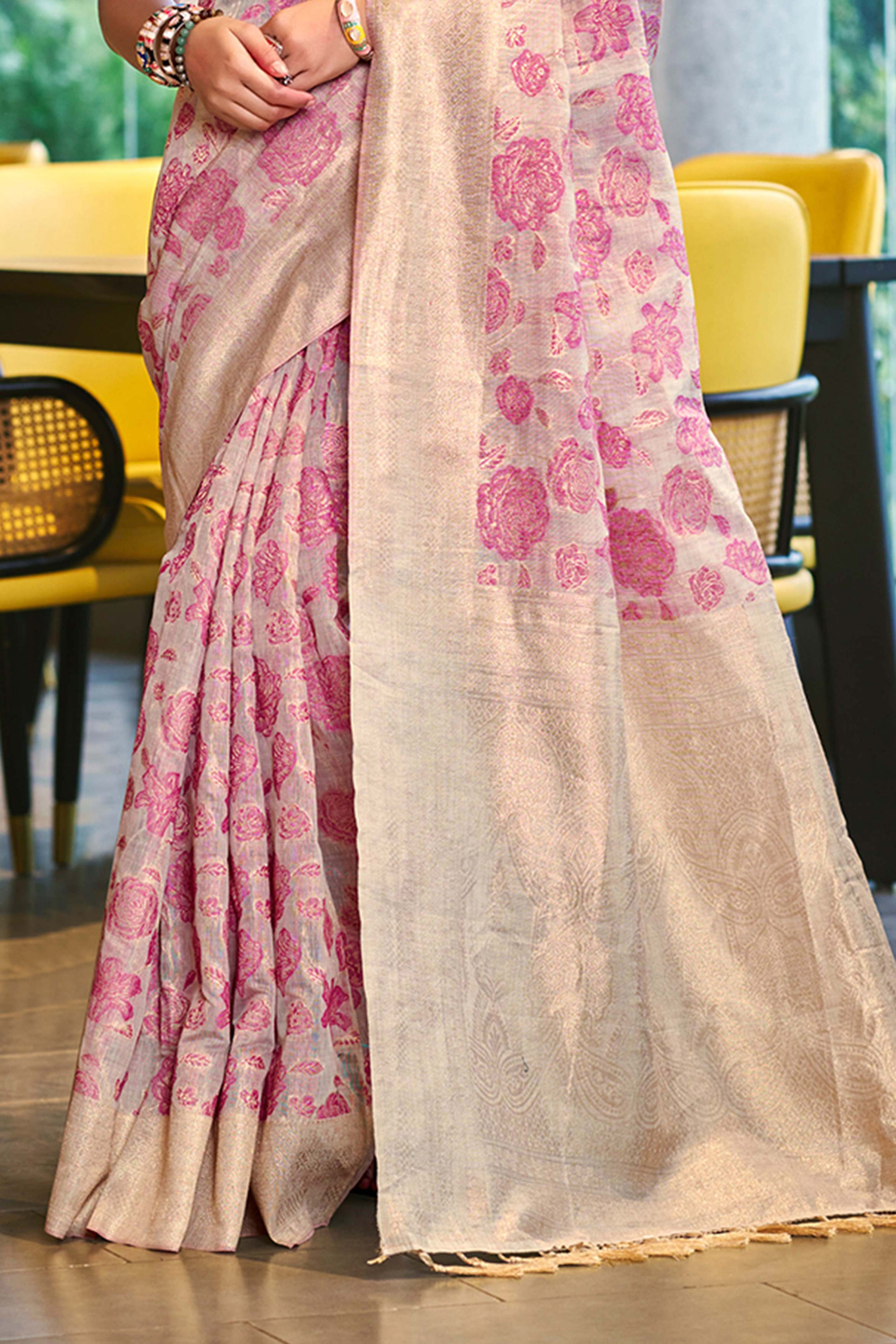 Pink Premium Cotton Silk Saree Highlighted With Floral Weaving Work & Tassel Pallu