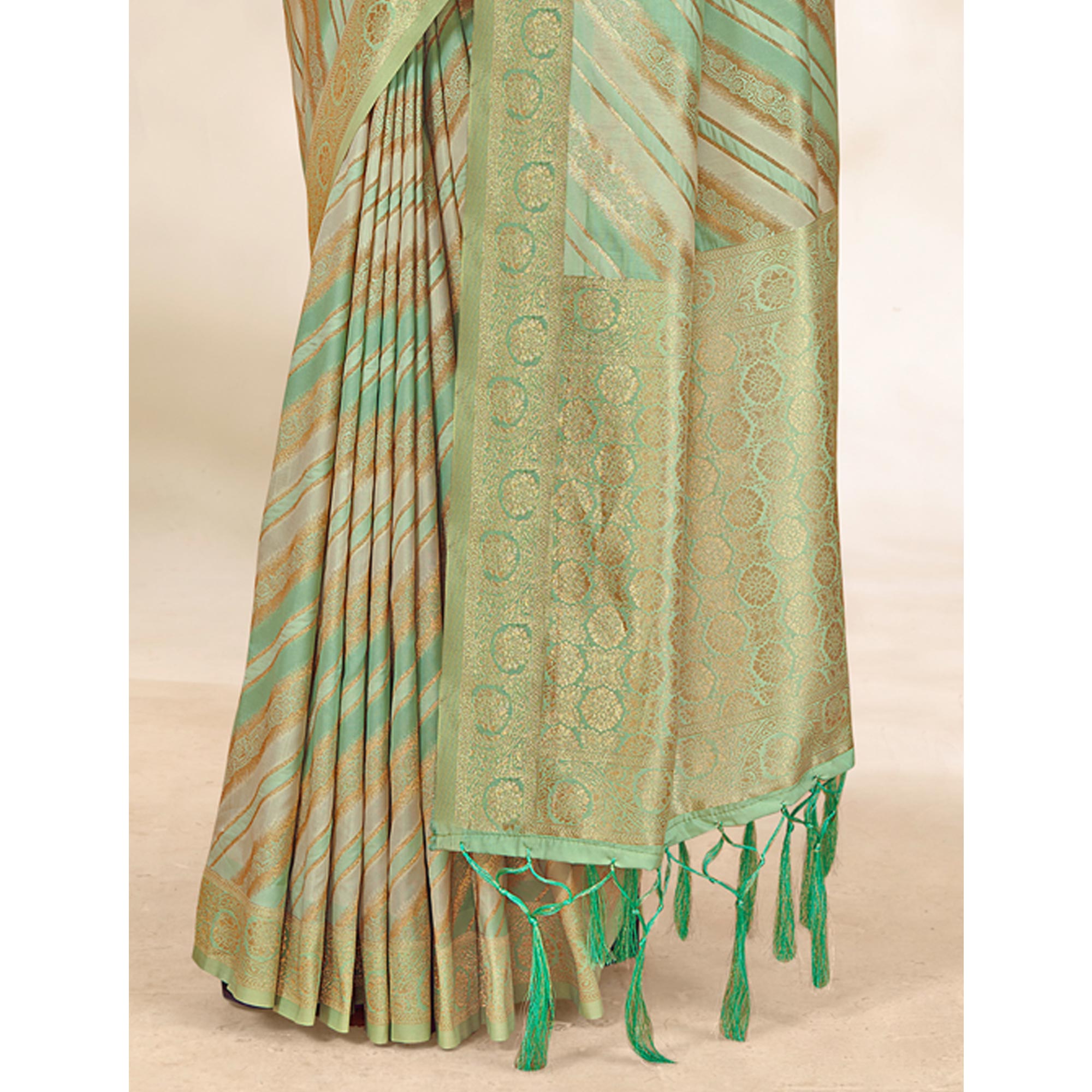 Pista Green Woven Cotton Silk Saree With Tassels
