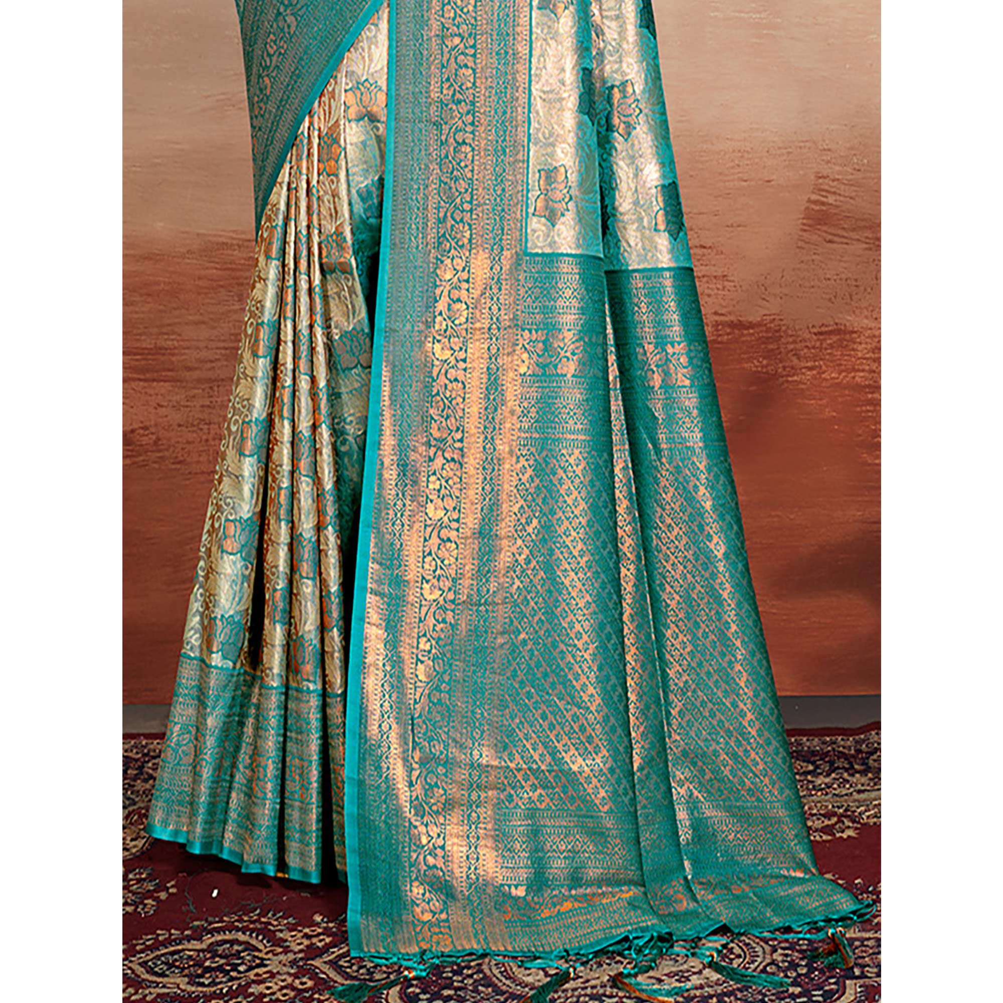 Turquoise Floral Woven Kanjivaram Silk Saree With Tassels