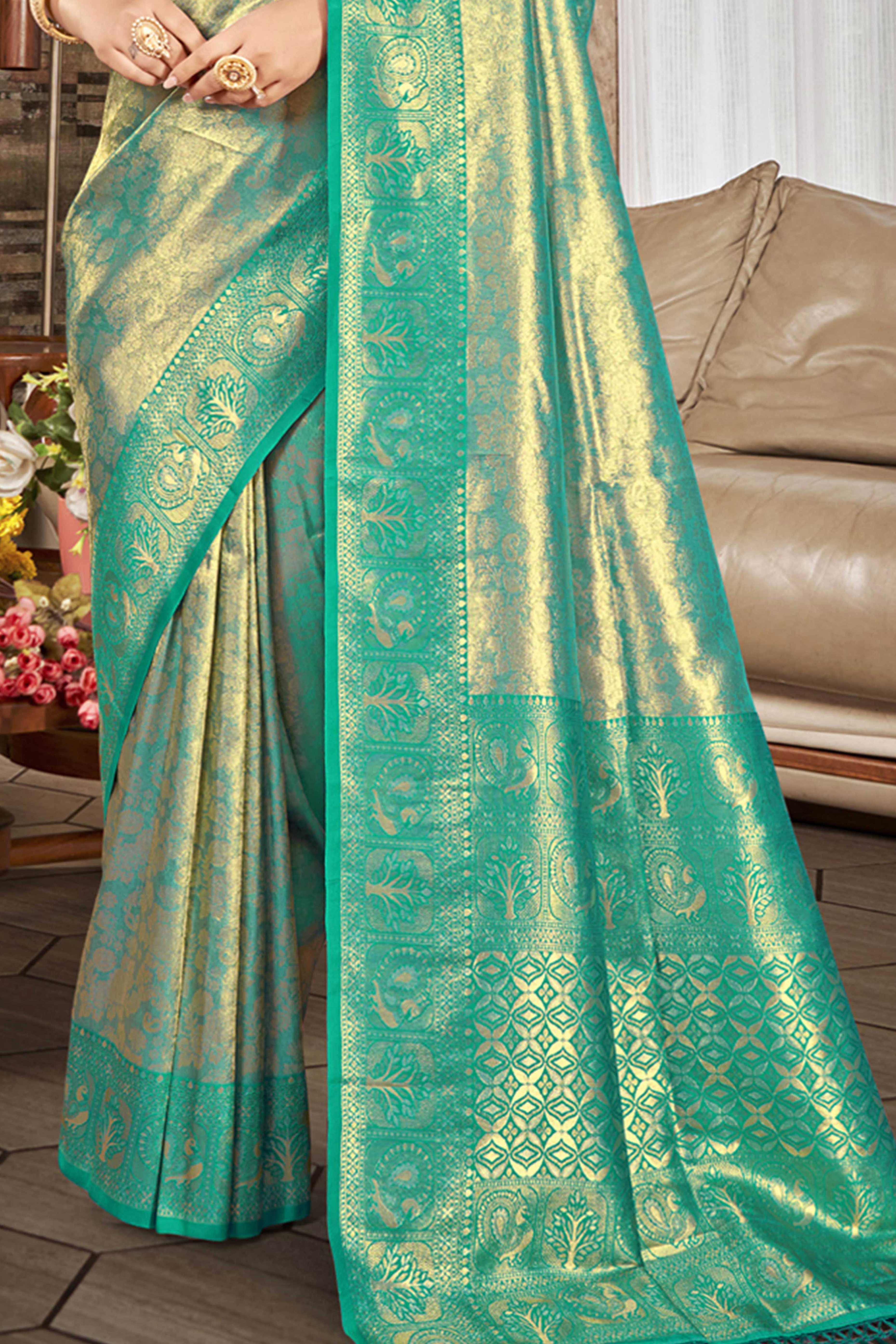 Premium Rama Green Floral and Peacock Motif Woven Kanjivaram Silk Saree With Tassel Pallu