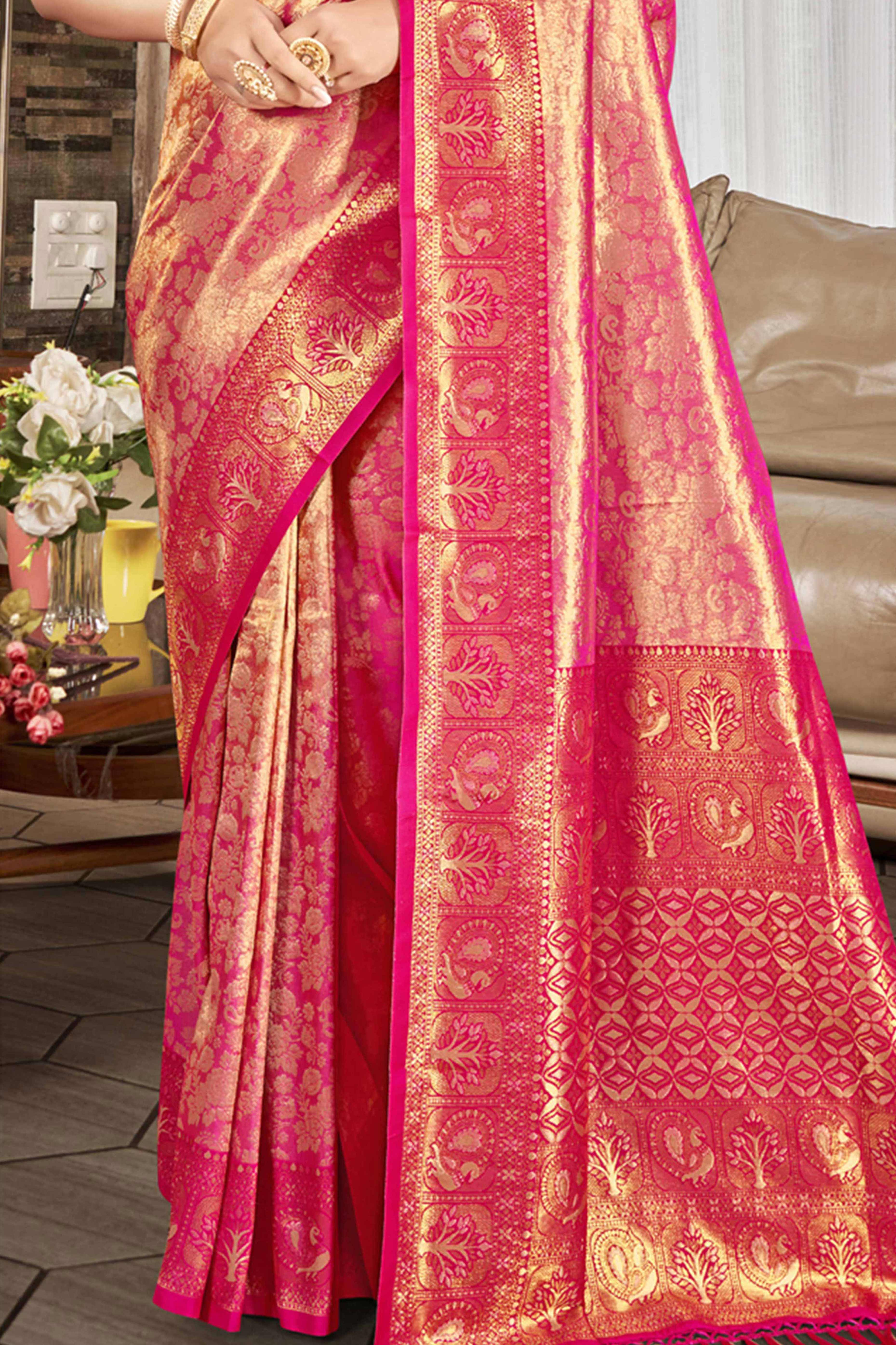 Premium Rani Pink Floral and Peacock Motif Woven Kanjivaram Silk Saree With Tassel Pallu