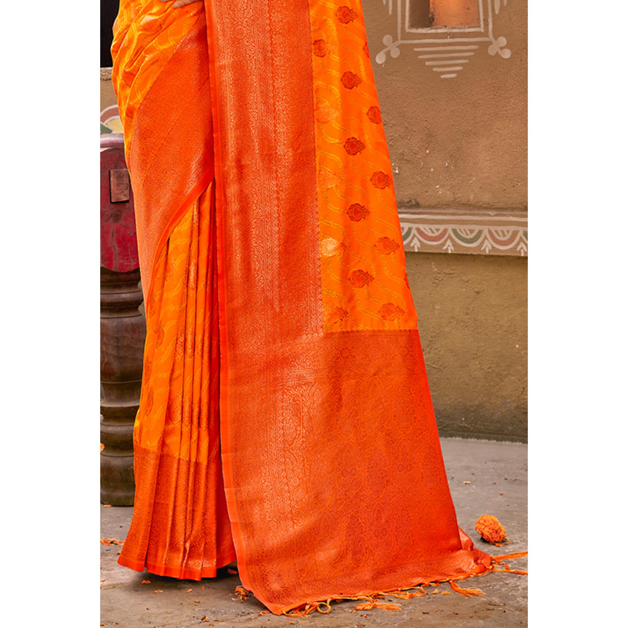 Orange Floral Woven Banarasi Silk Saree With Tassels