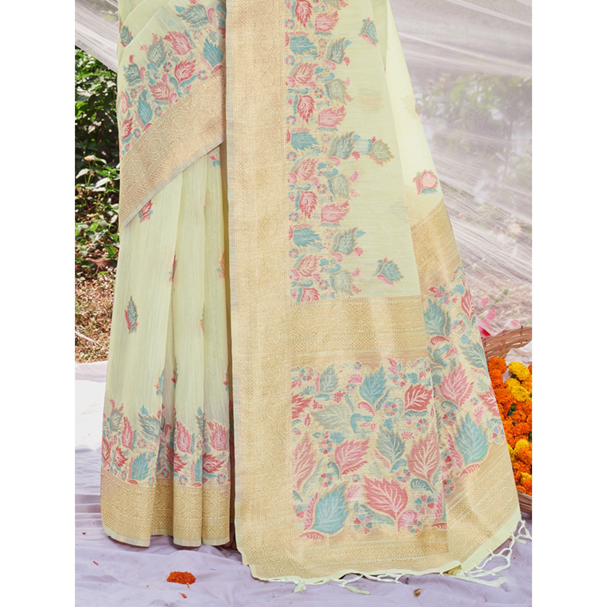 Mint Green Floral Woven Cotton Silk Saree With Tassels