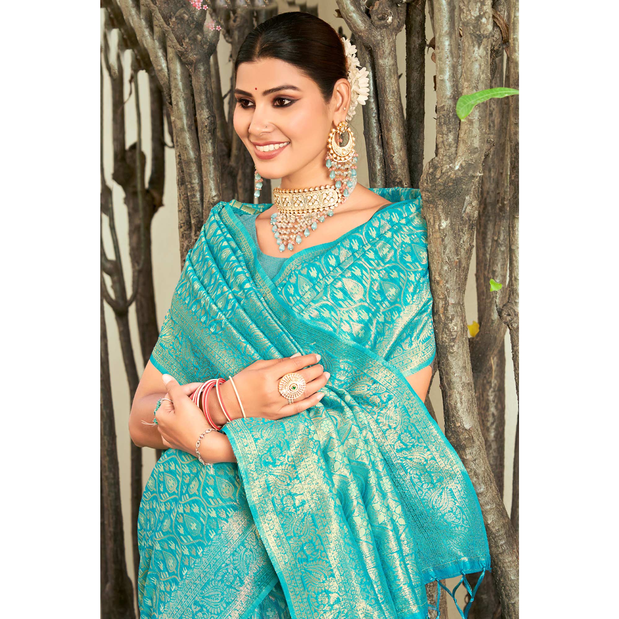 Blue Floral Woven Cotton Blend Saree With Tassels