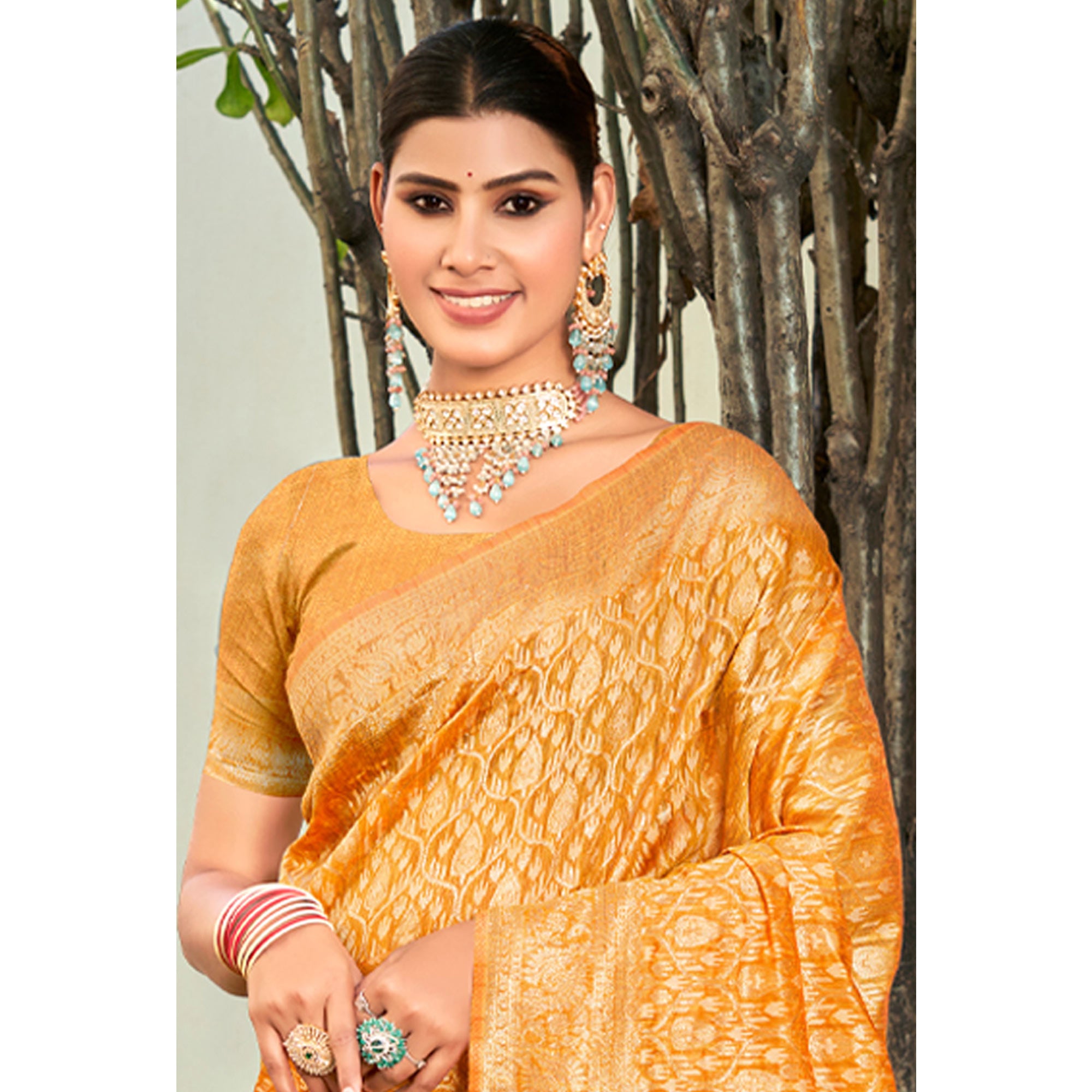 Mustard Floral Woven Cotton Blend Saree With Tassels