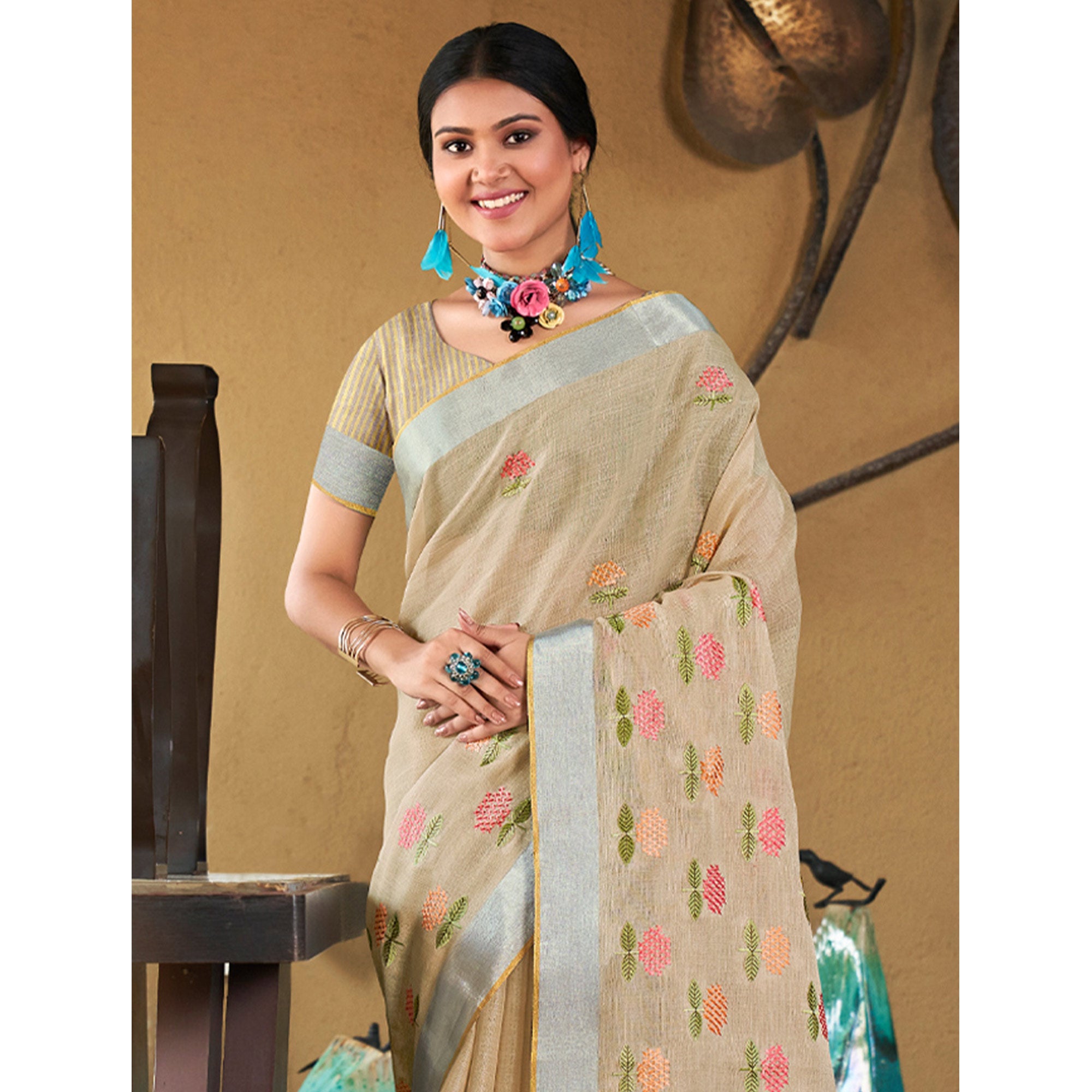 Beige Floral Embroidered Linen Saree With Tassels
