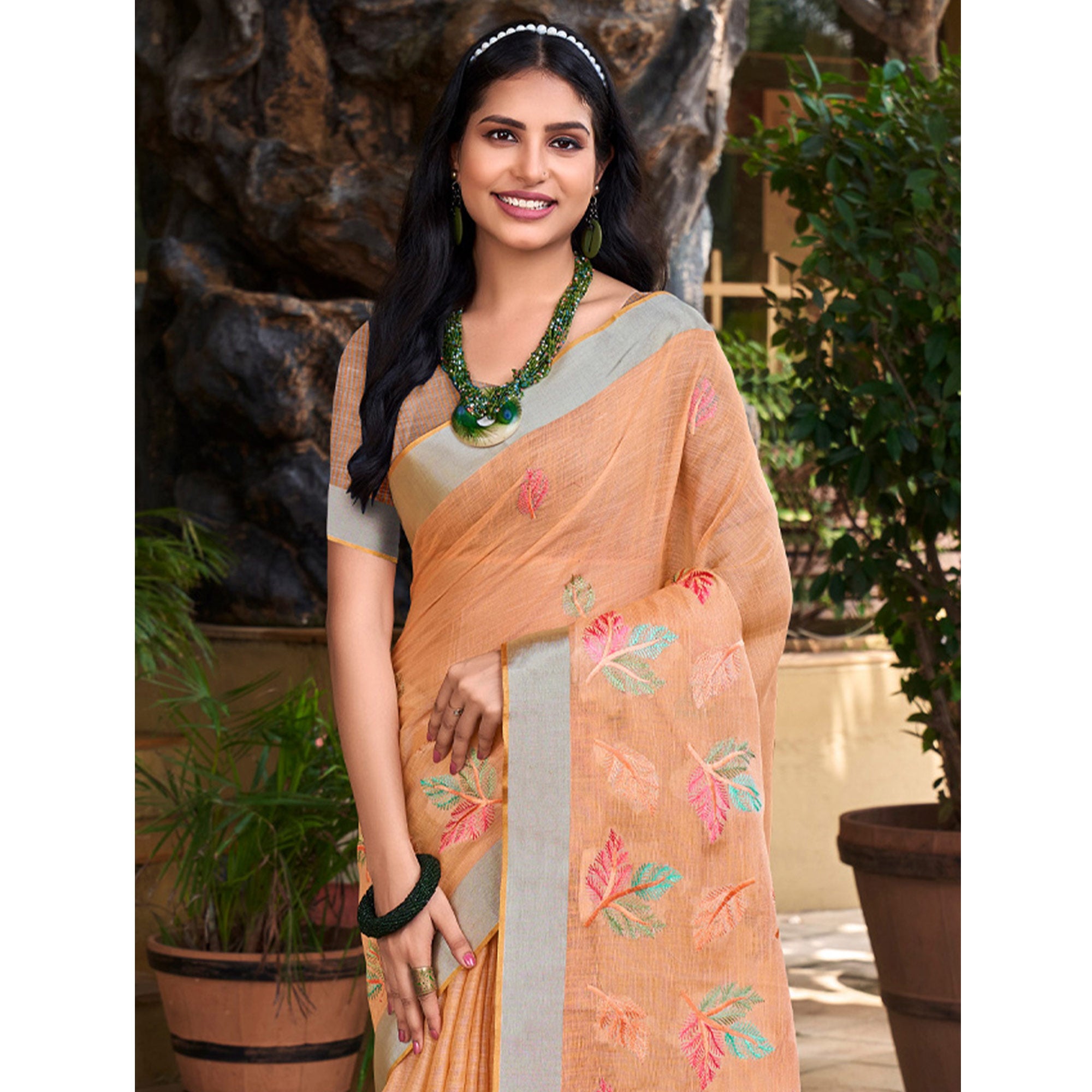 Orange Floral Embroidered Linen Saree With Tassels