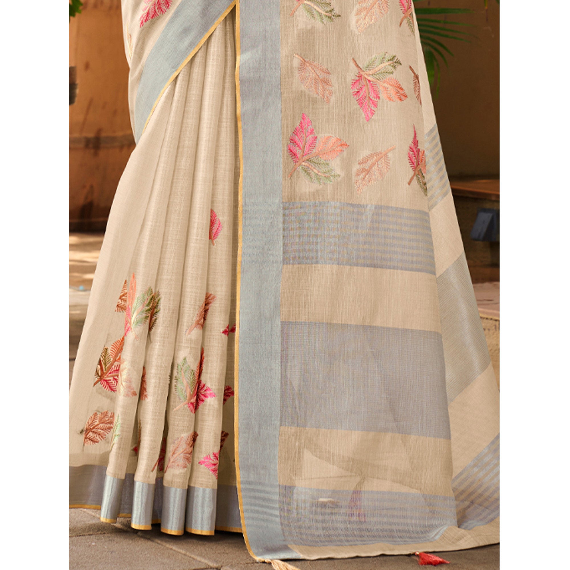 Beige Floral Embroidered Linen Saree With Tassels