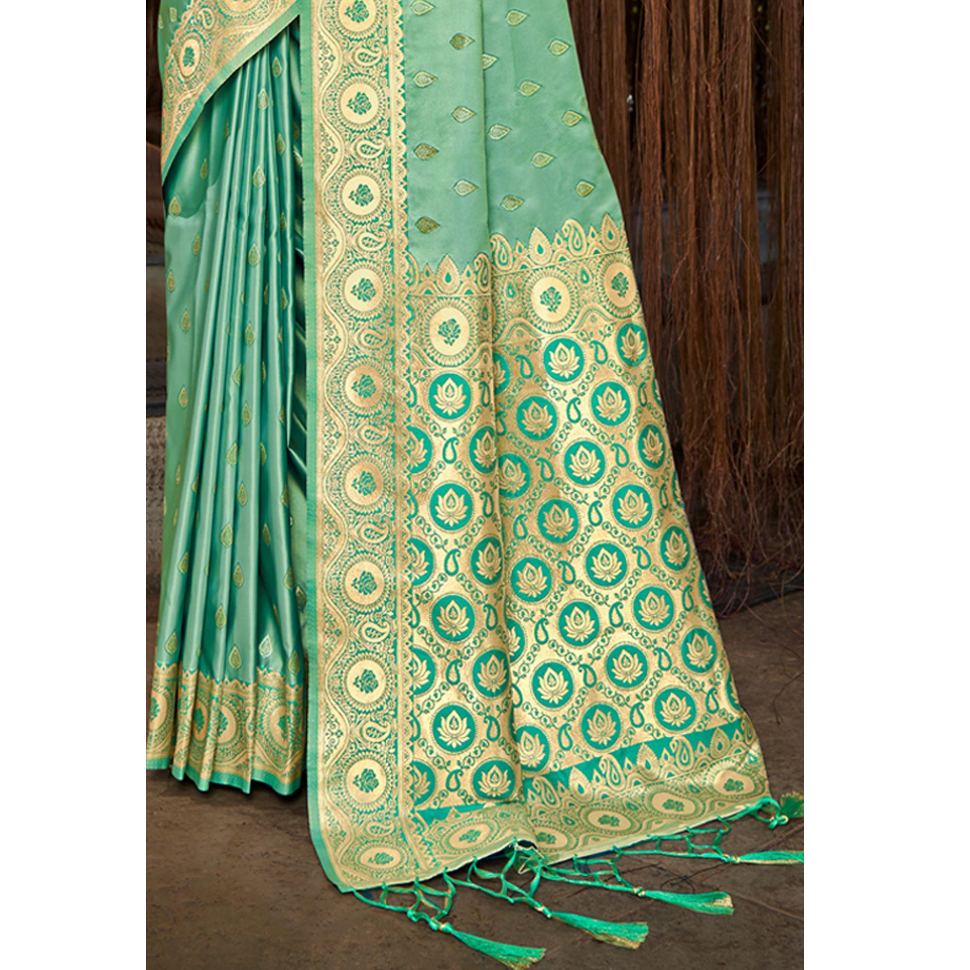 Sea Green Woven Satin Silk Saree With Tassels