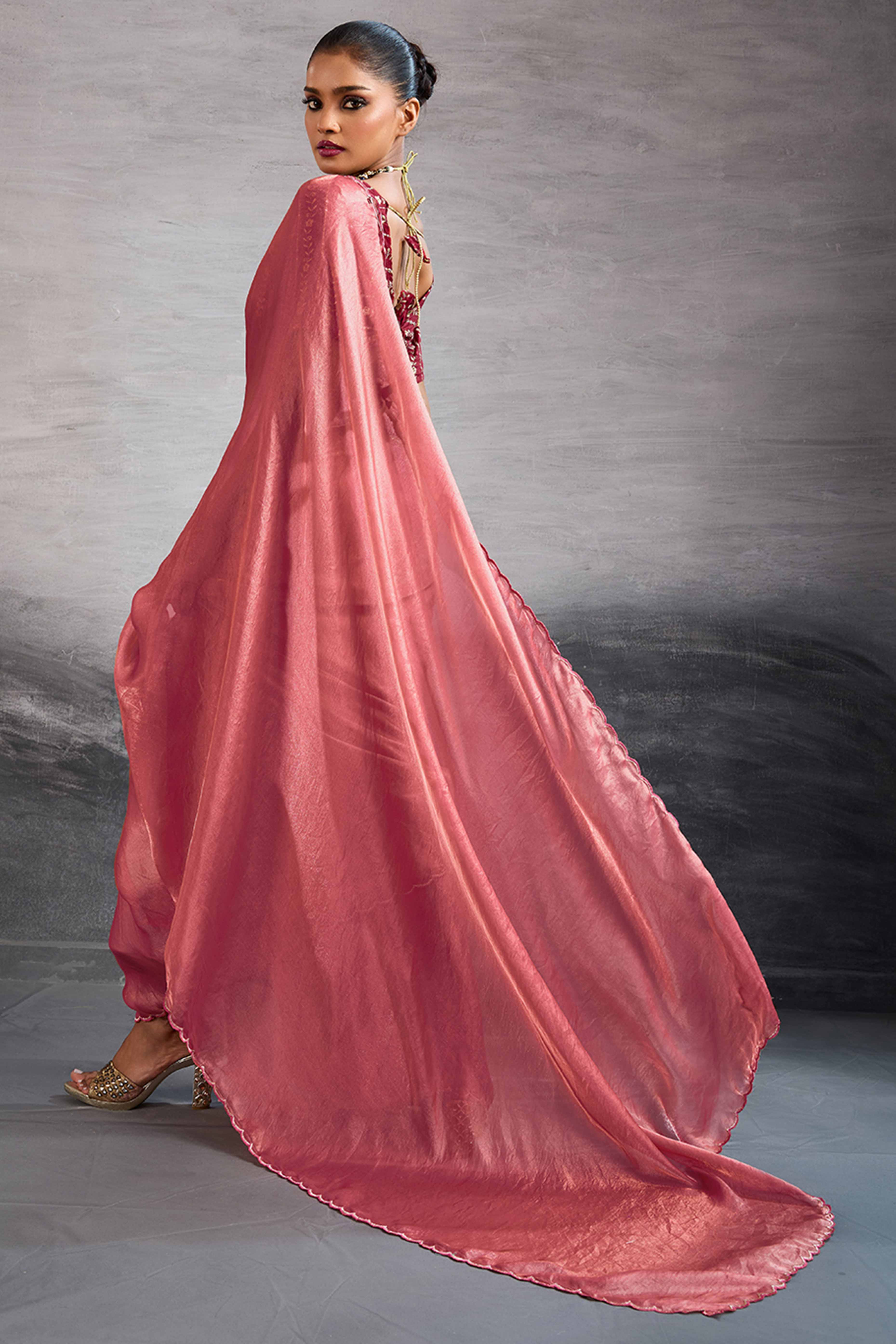 Coral Pink Solid Organza Jimmy Choo Saree Accentuated With Elegant Cutwork Border Detailing