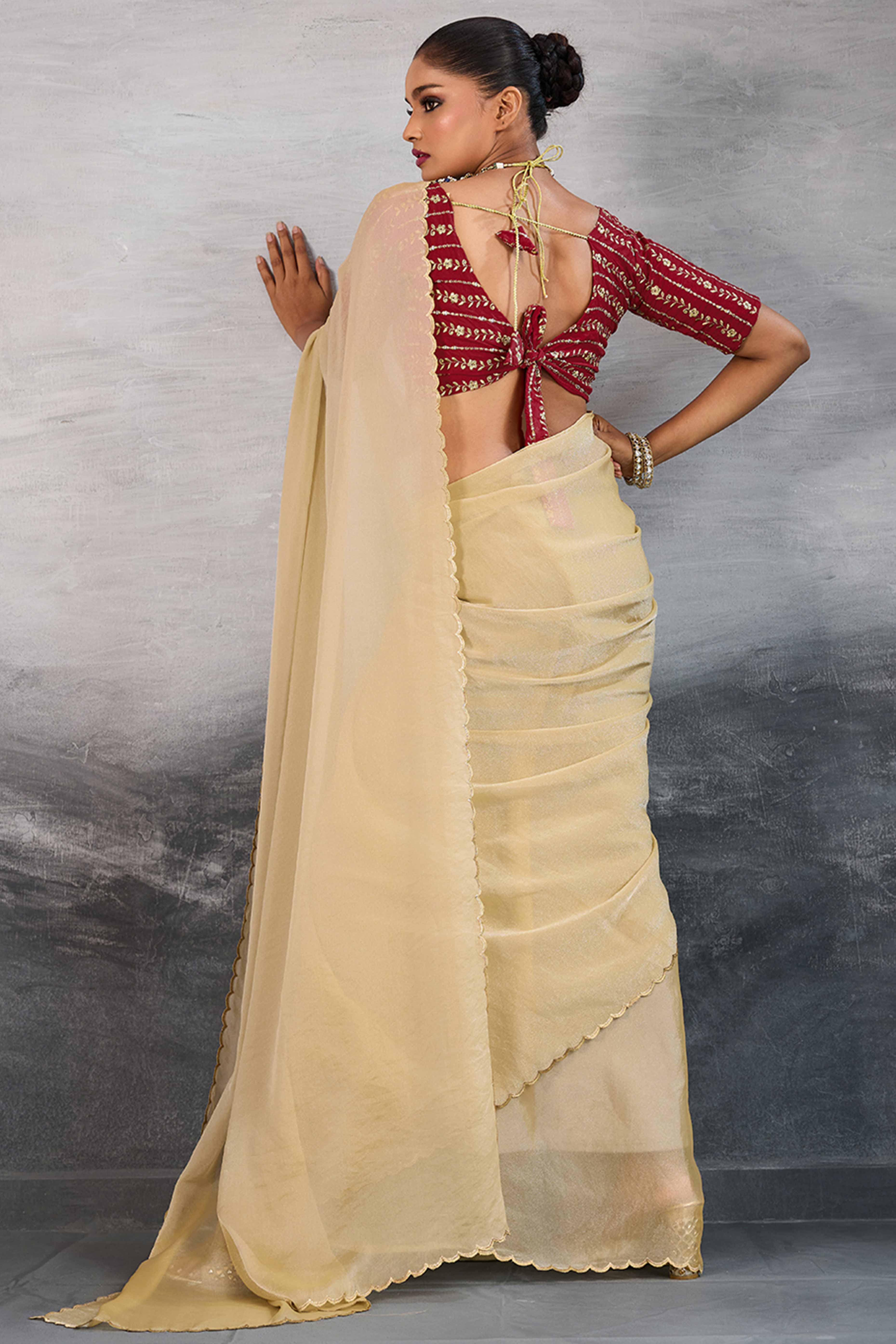 Cream Solid Organza Jimmy Choo Saree Accentuated With Elegant Cutwork Border Detailing