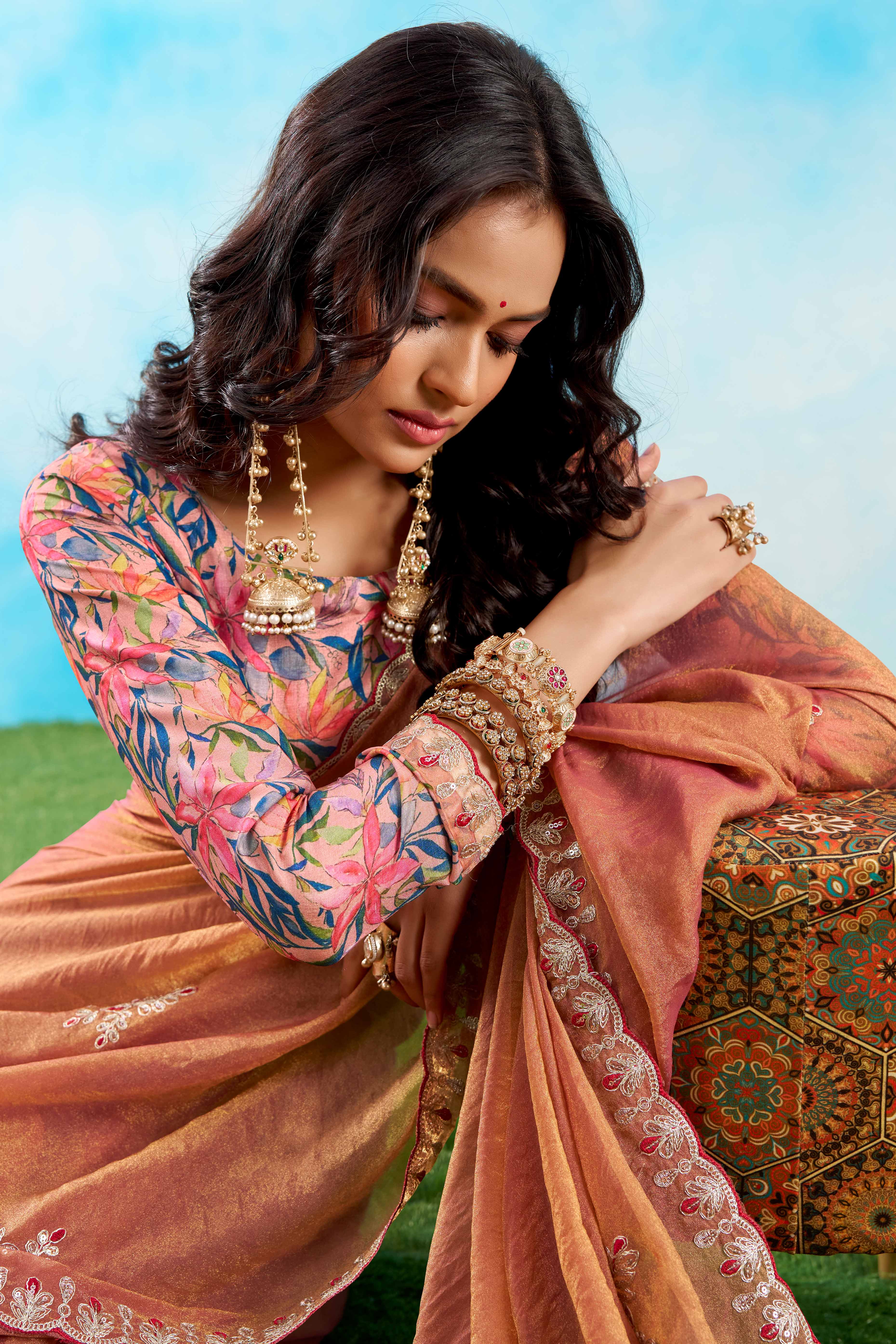 Luxurious Peach Chiffon Saree Showcasing Floral Sequins Embroidery In A Two Tone Finish