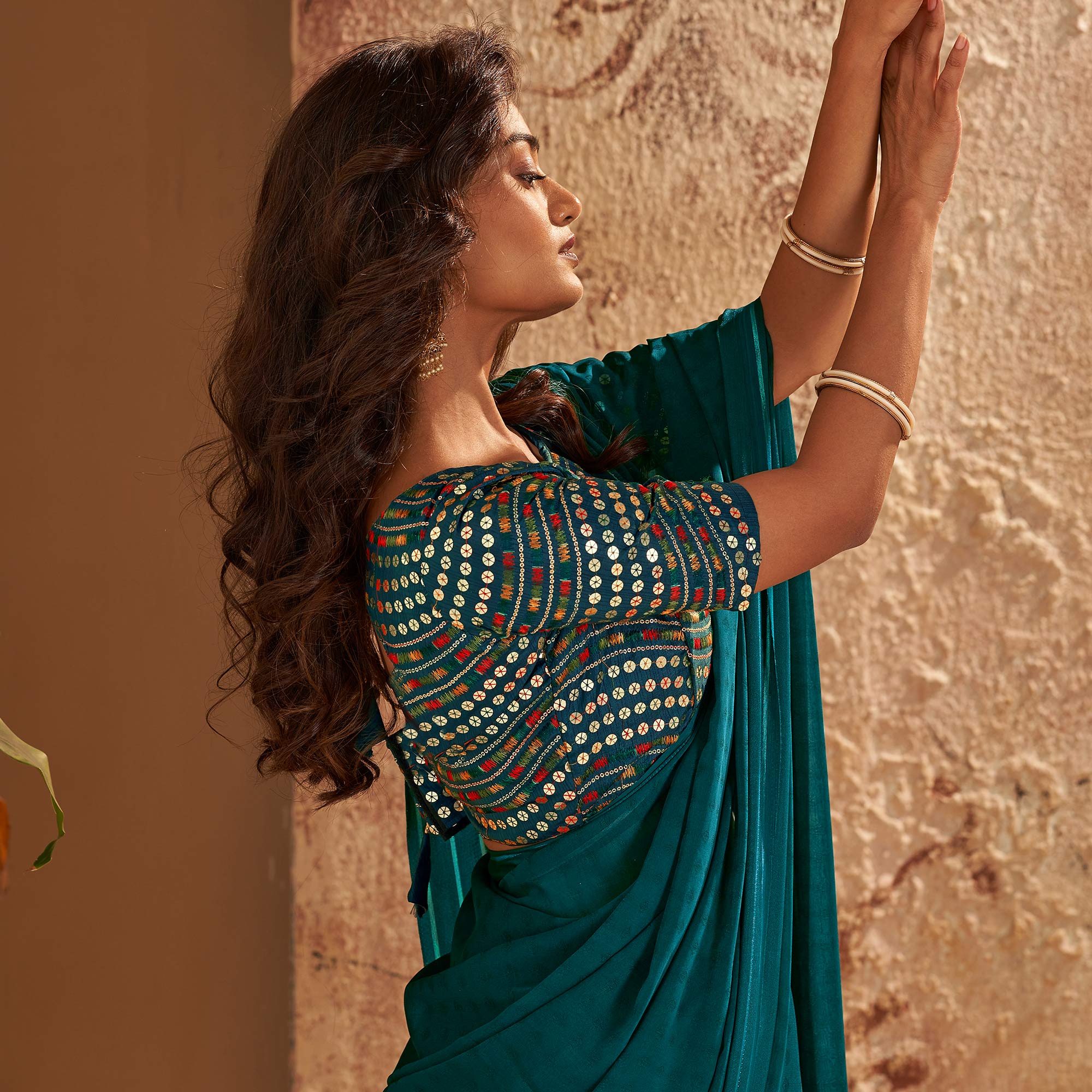 Teal Woven Georgette Saree With Tassels