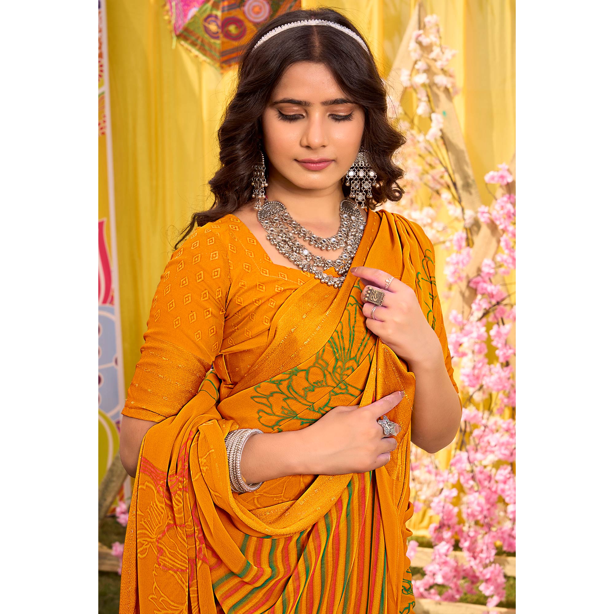 Mustard Floral Printed Georgette Saree With Woven Border