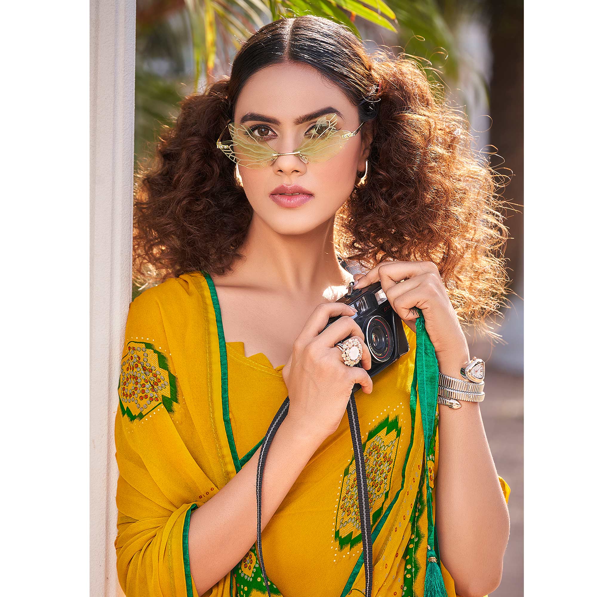 Mustard Foil Printed Georgette Saree With Tassels