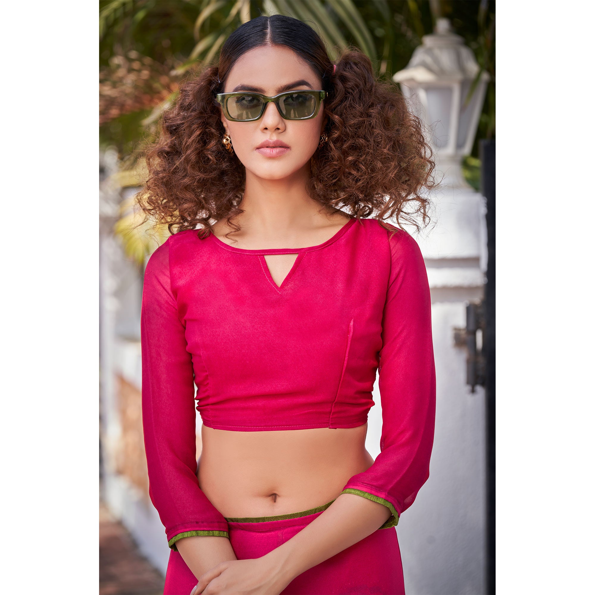 Pink Foil Printed Georgette Saree With Tassels