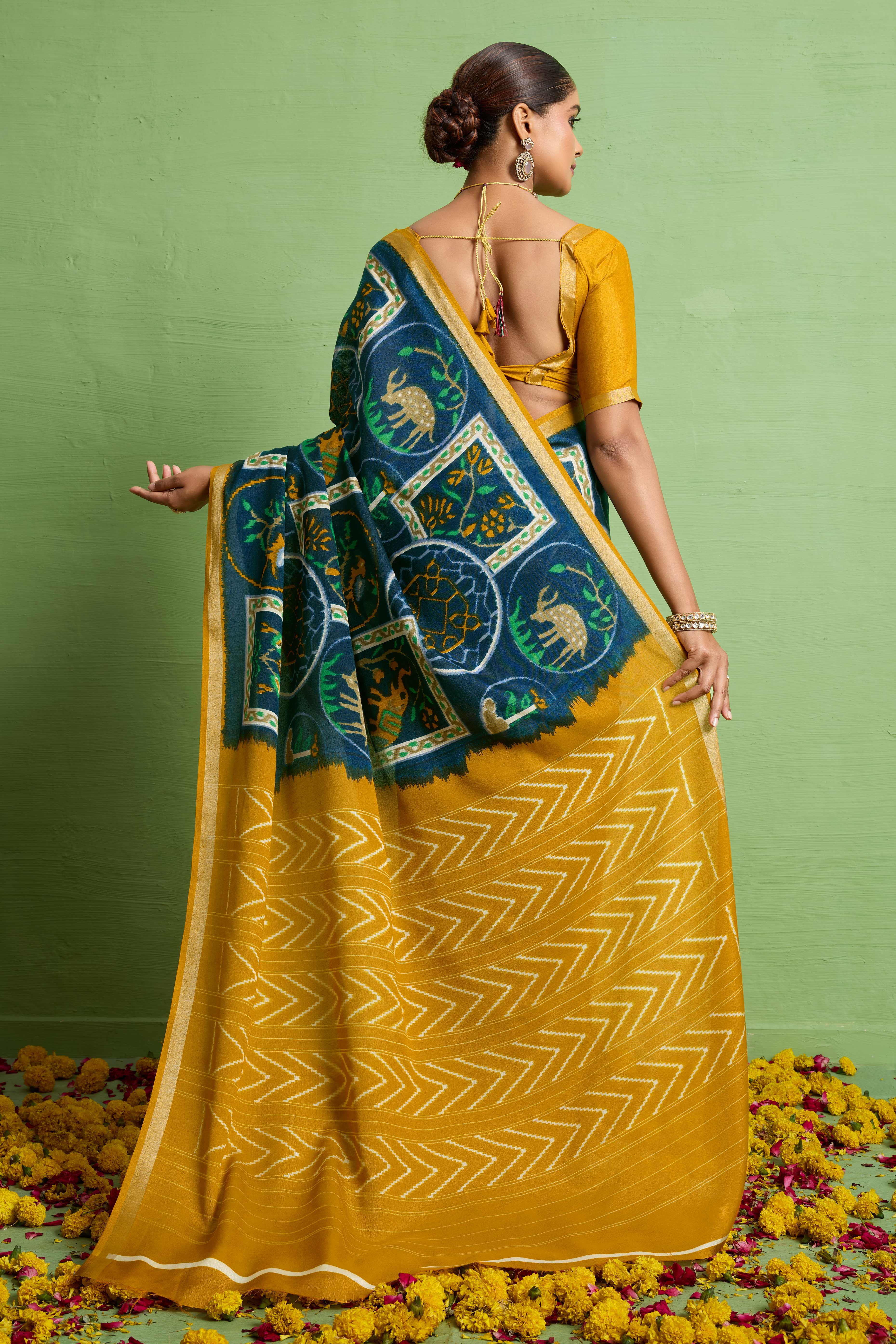 Traditional Morpich Blue Silk Blend Saree with Ikkat Print & Zari Edging