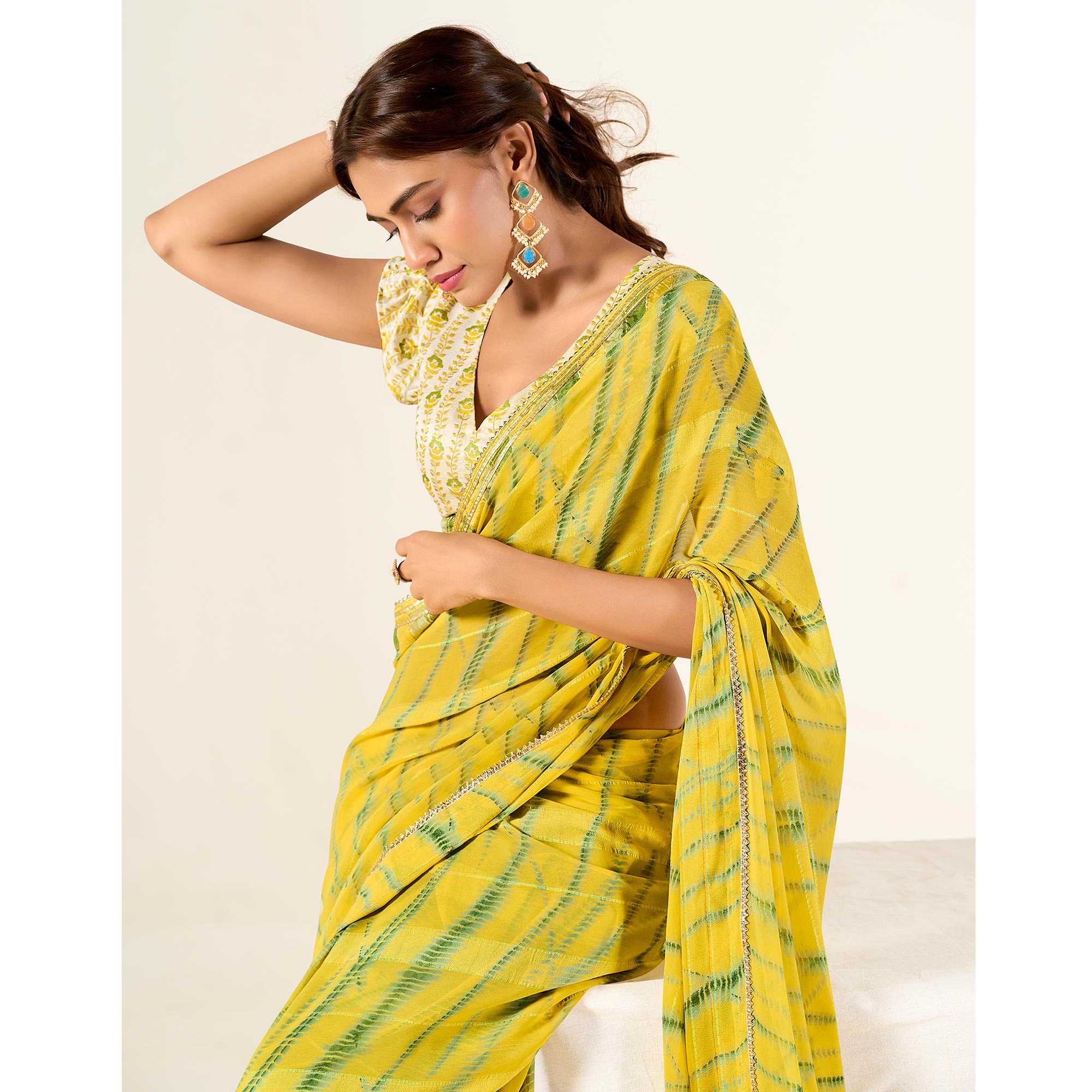 Yellow Printed With Woven Georgette Saree With Tassels