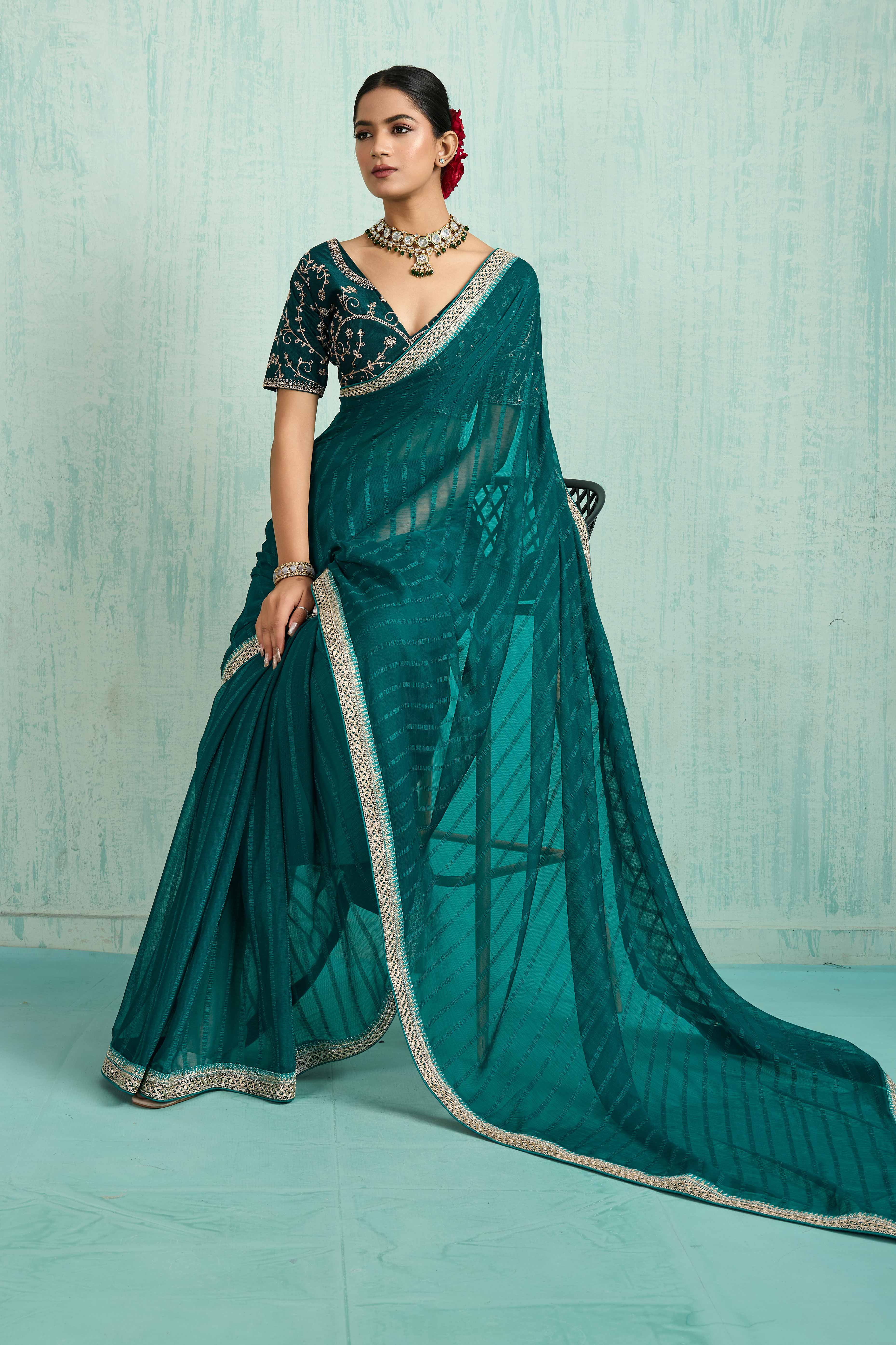 Teal Chiffon Saree With Elegant Stripes & Sequins Embroidered Border