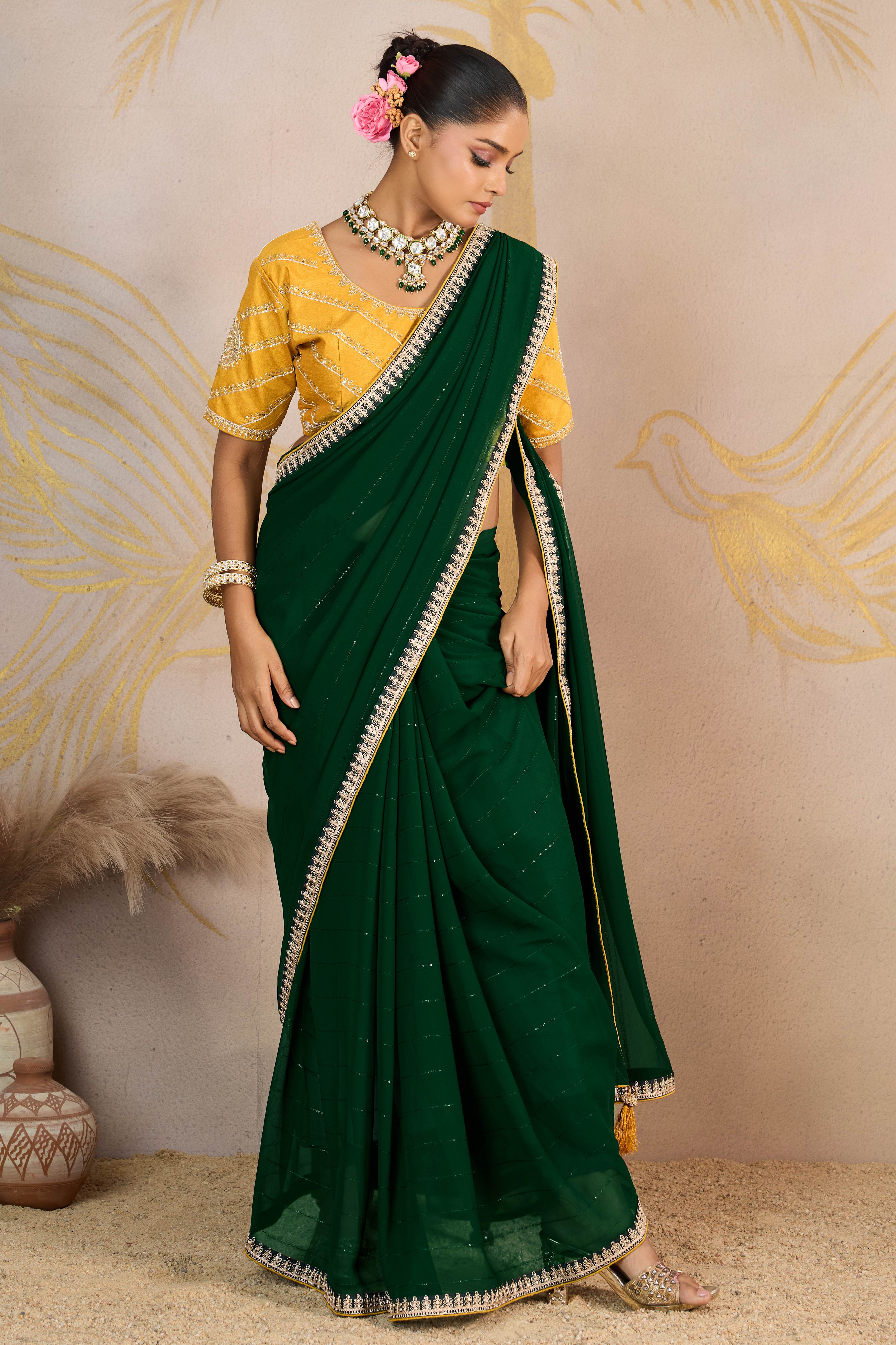 Green Zari Embroidered Georgette Saree Accented With Sequins