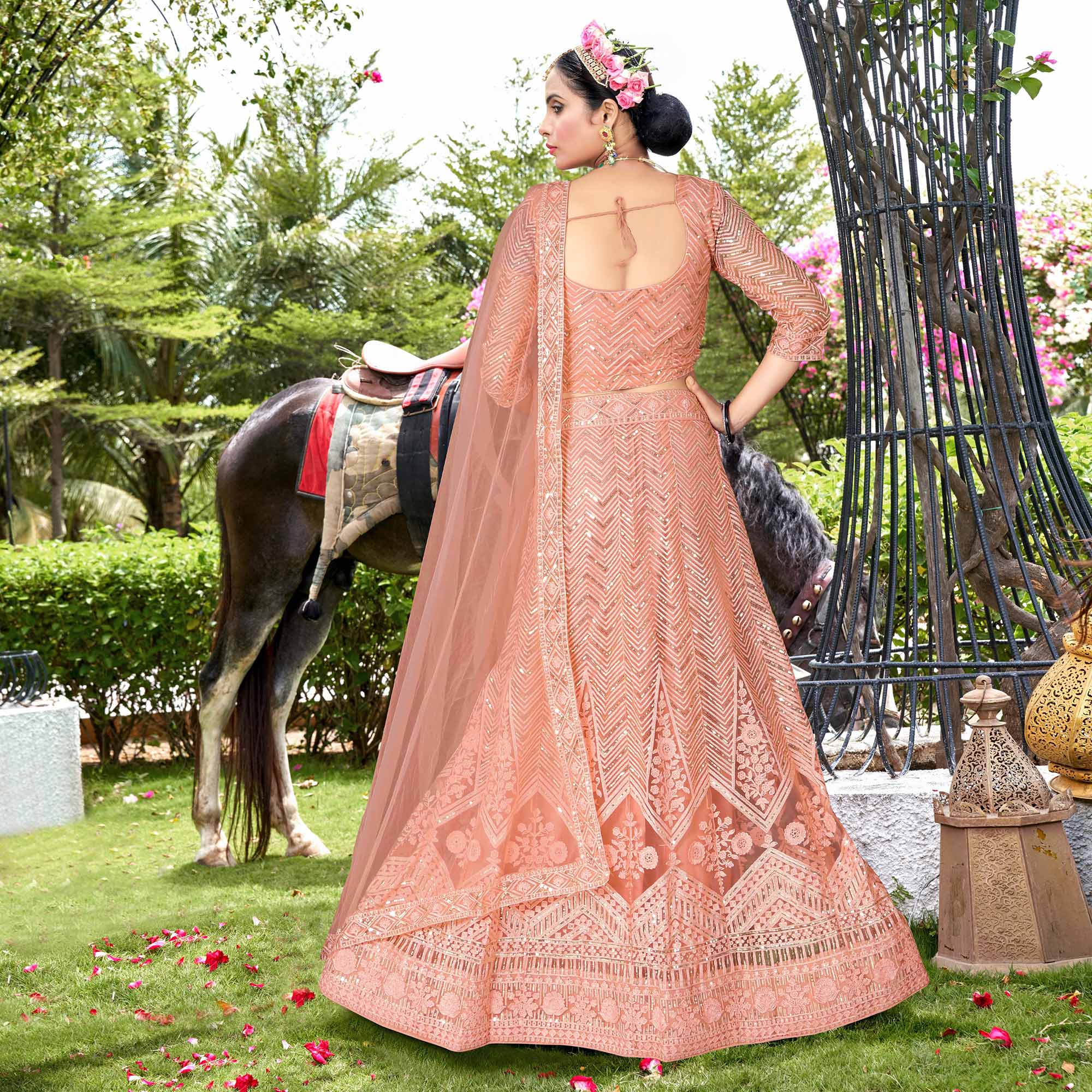 Peach Sequins Floral Embroidered Net Semi Stitched Lehenga Choli